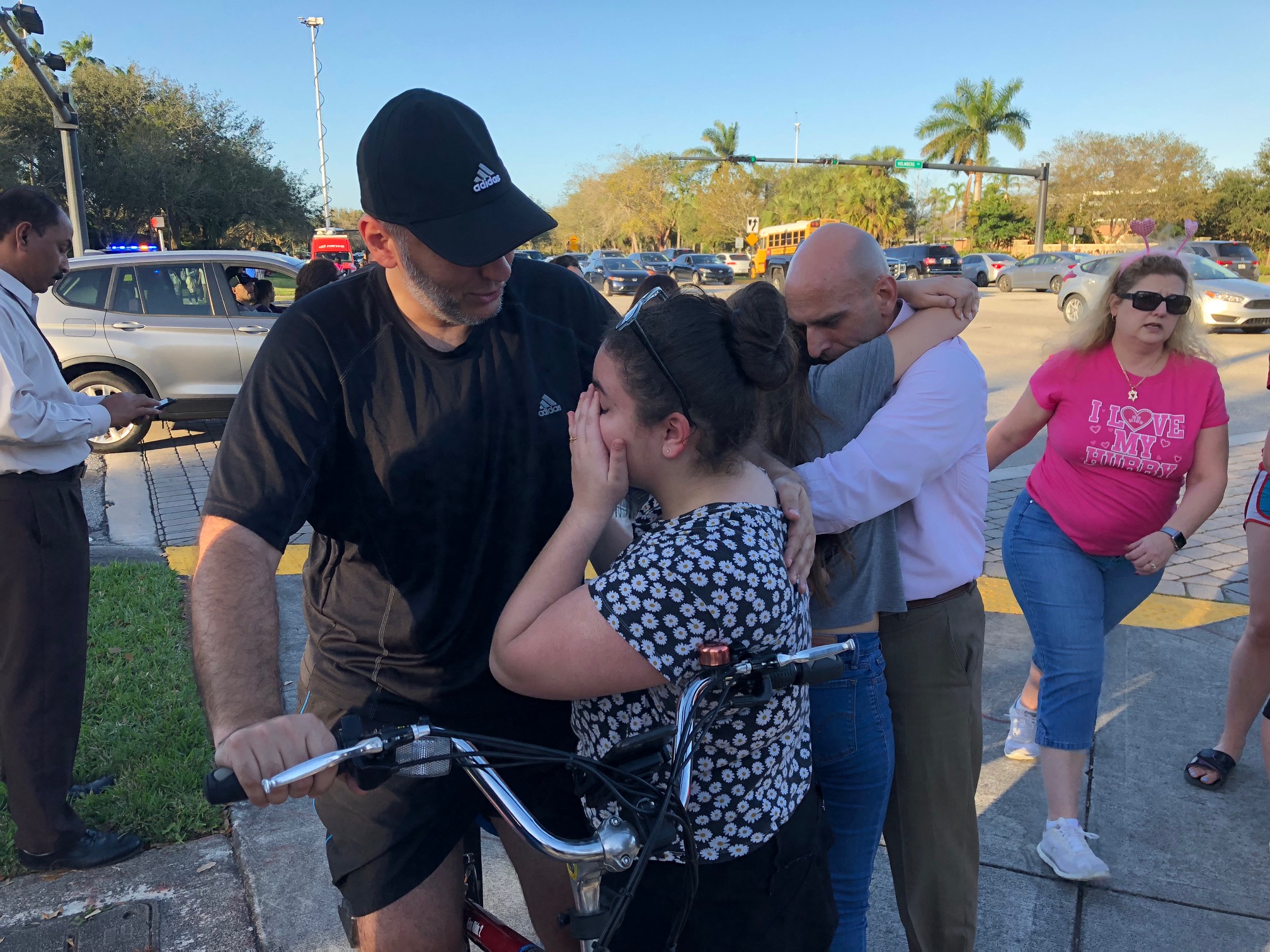 Family members and students react outside the school following the shooting in Parkland, Florida in February 2018 | Source: Getty Images