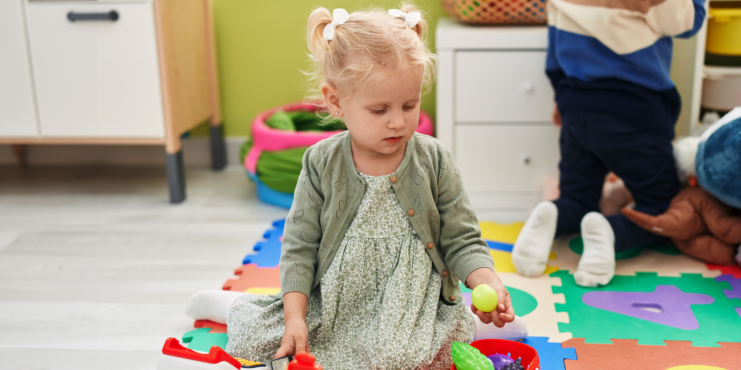 A little girl in a daycare center | Source: Shutterstock