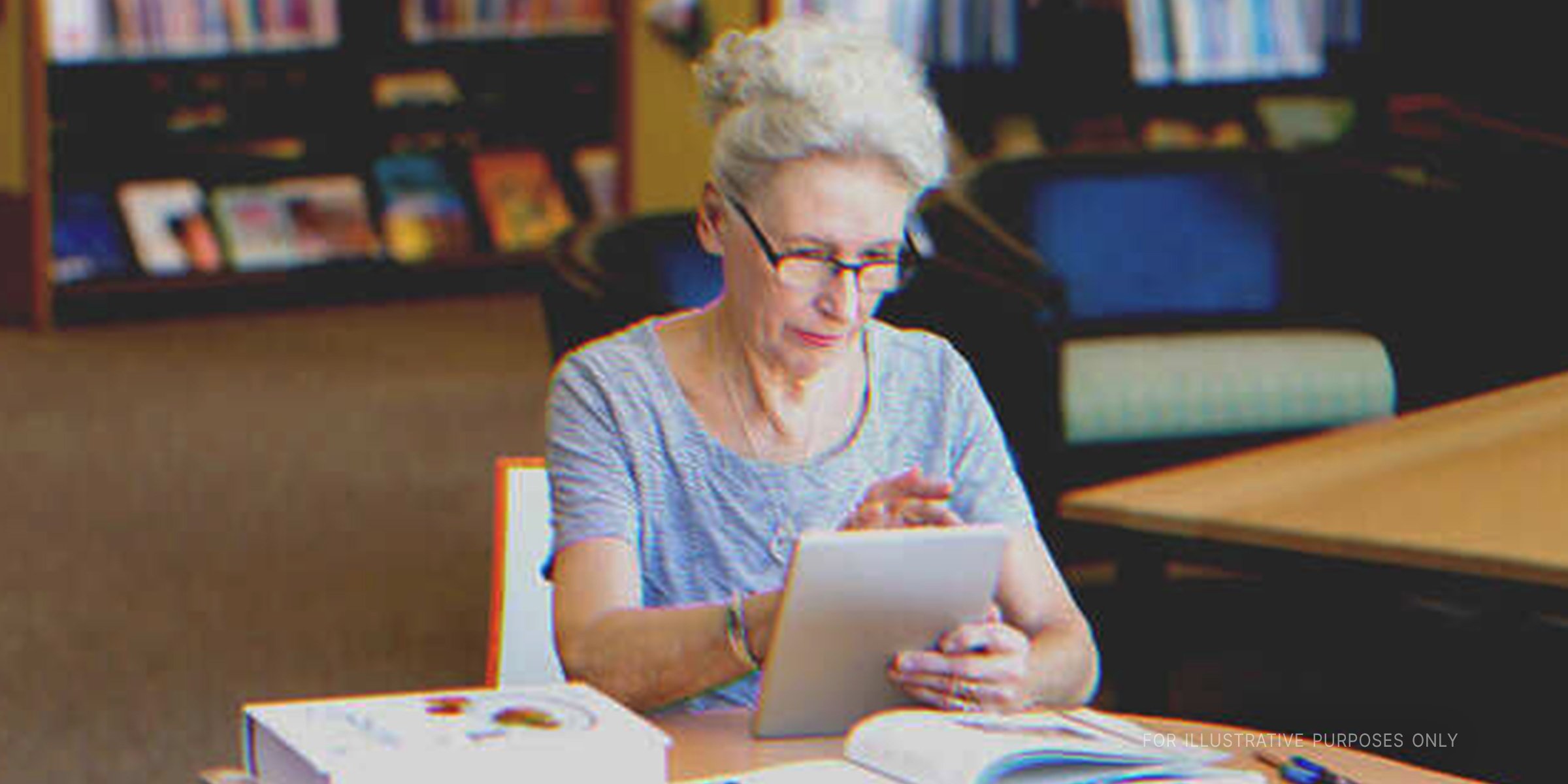 Elderly woman using a tablet | Source: Shutterstock