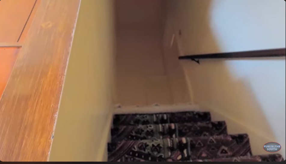 Elvis Presley's secret staircase in his Graceland Mansion from a video dated March 22, 2023 | Source: youtube.com/@officialfuninthesouth
