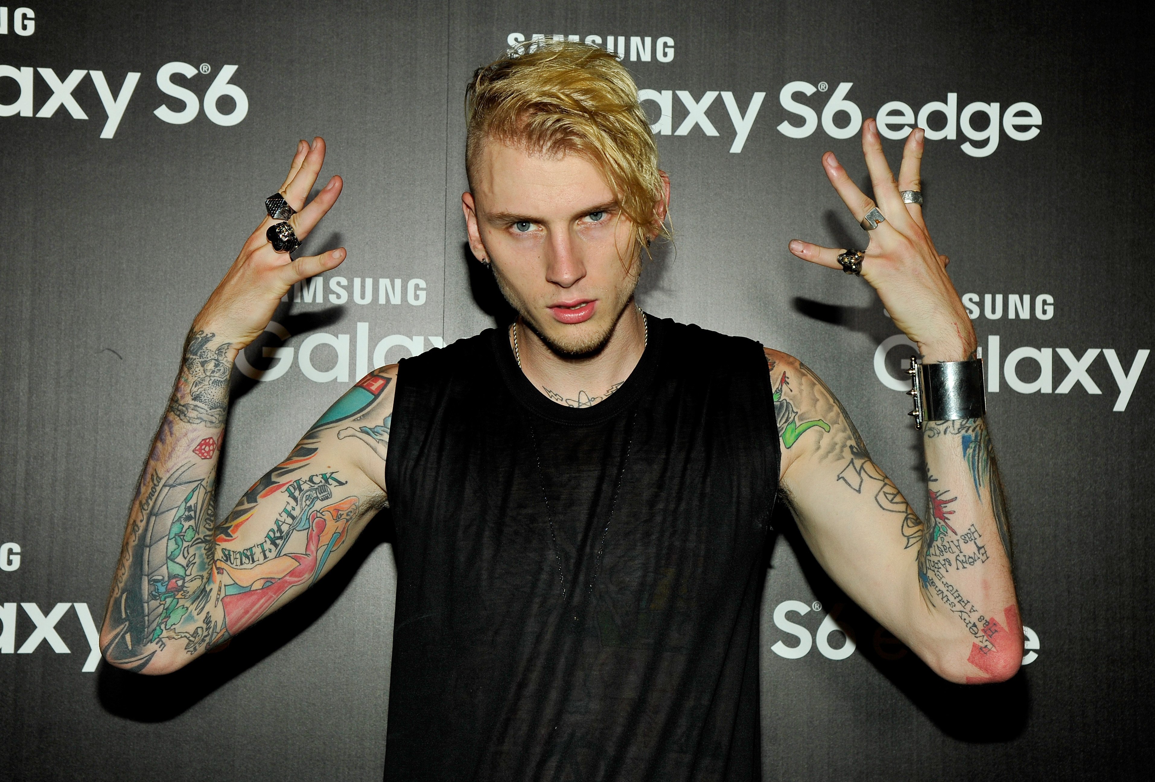 Machine Gun Kelly's Jessica Rabbit tattoo on his right bicep. | Source: Getty Images