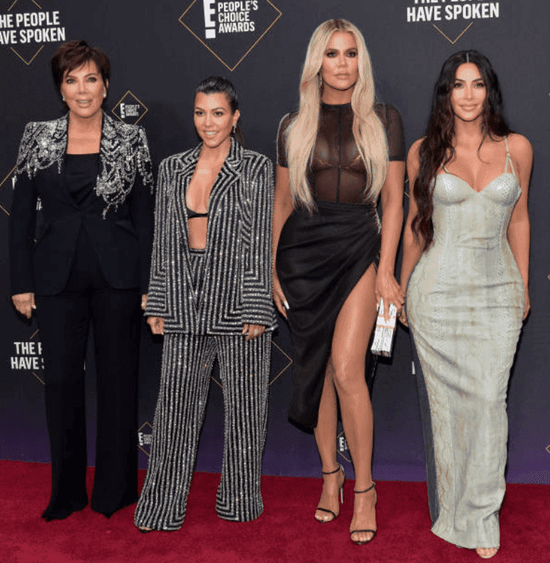 Kris Jenner, Kourtney Kardashian, Khloé Kardashian and Kim Kardashian pose side by side on the red carpet for the 2019 E! People's Choice Awards, on November 10, 2019 in Santa Monica, California | Source: Getty Images (Photo by Rodin Eckenroth/WireImage)
