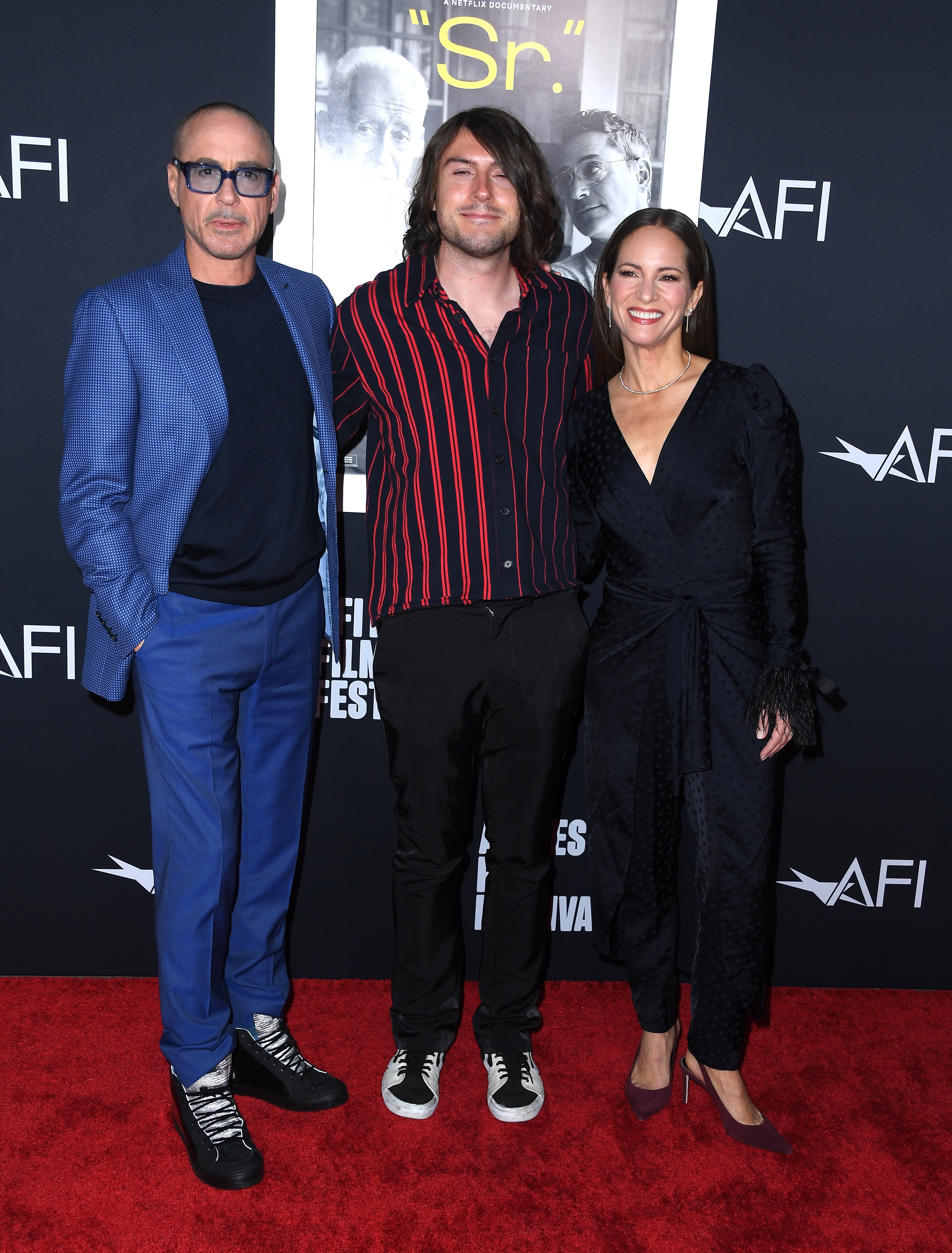 Indio Falconer Downey, Robert Downey Jr. and Susan Downey arrives at the 2022 AFI Fest - "Sr." Special Screening at TCL Chinese Theatre in Hollywood, California on November 04, 2022 | Source: Getty Images