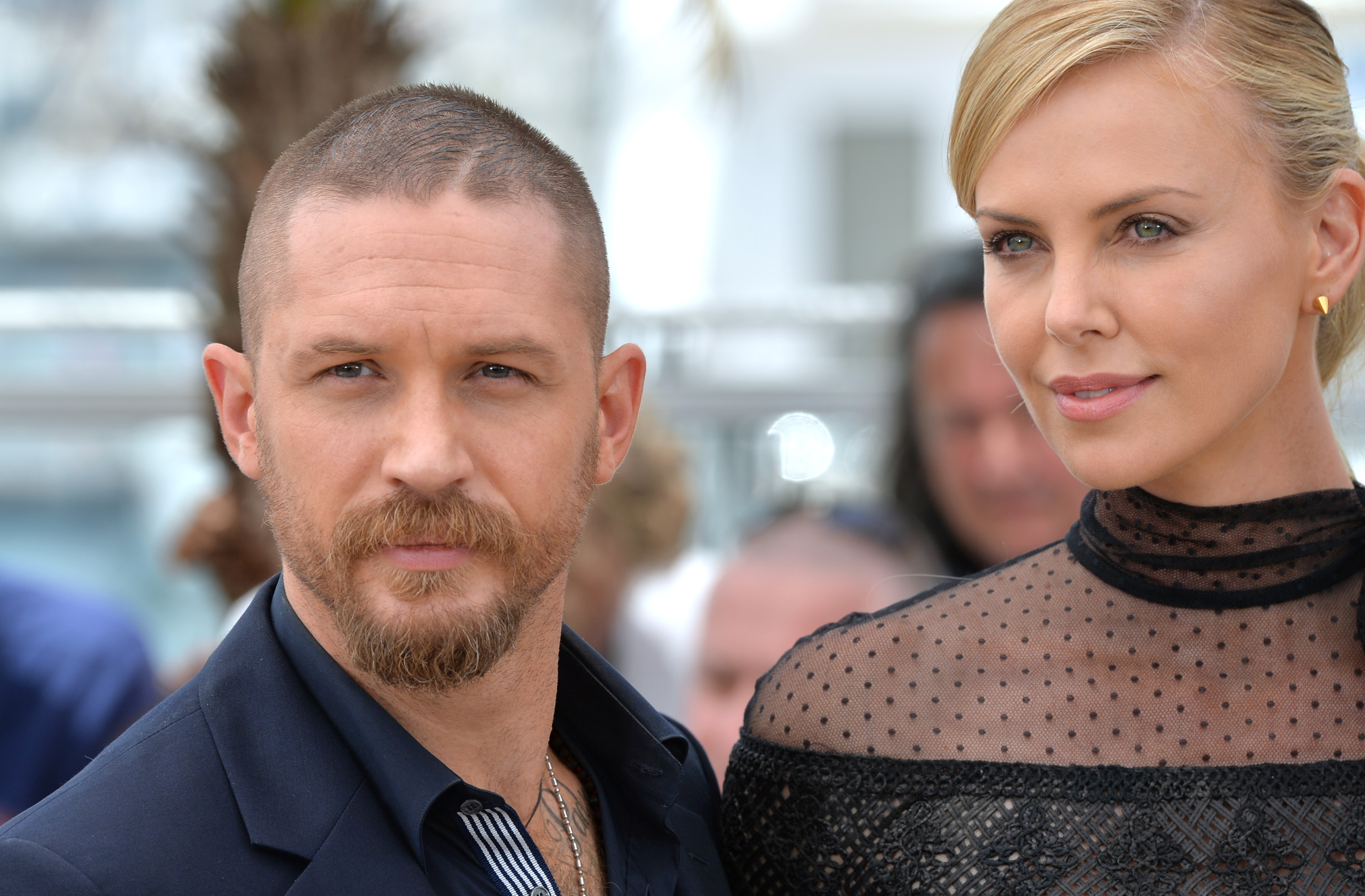 Tom Hardy and Charlize Theron attend the "Mad Max: Fury Road" photocall during the 68th annual Cannes Film Festival on May 14, 2015 in Cannes, France | Source: Getty Images