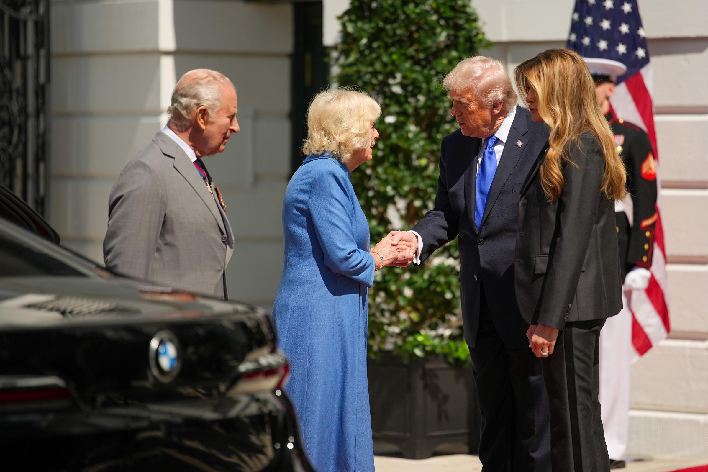 King Charles III, Queen Camilla, Donald Trump, and Melania Trump attend a White House farewell ceremony, where Donald is seen warmly complimenting Camilla, in Washington, DC, on April 30, 2026. | Source: Getty Images