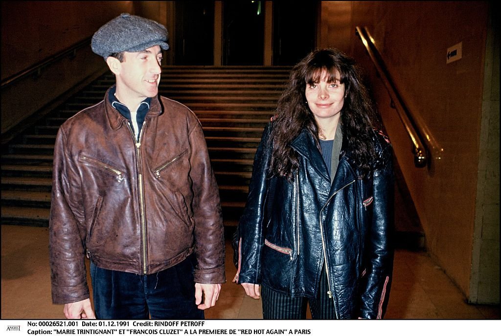 Marie Trintignant et Francois Cluzet à la première de "Red Hot Again" à Paris. | Photo : Getty Images