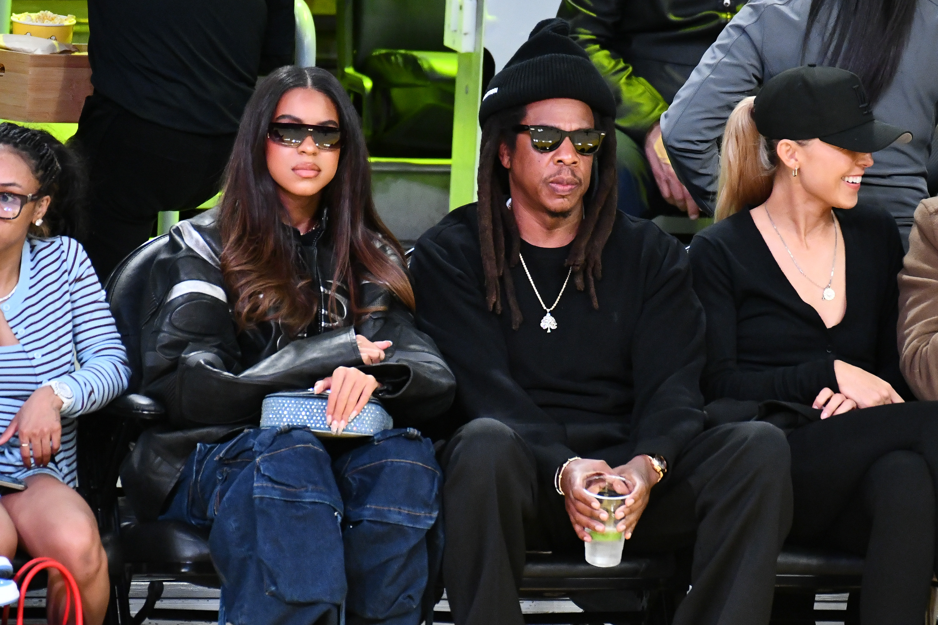 Blue Ivy Carter, 13, was seated courtside with her father, Jay-Z, while attending a basketball game between the Los Angeles Lakers and San Antonio Spurs at Crypto.com Arena on December 10, 2025, in Los Angeles, California.