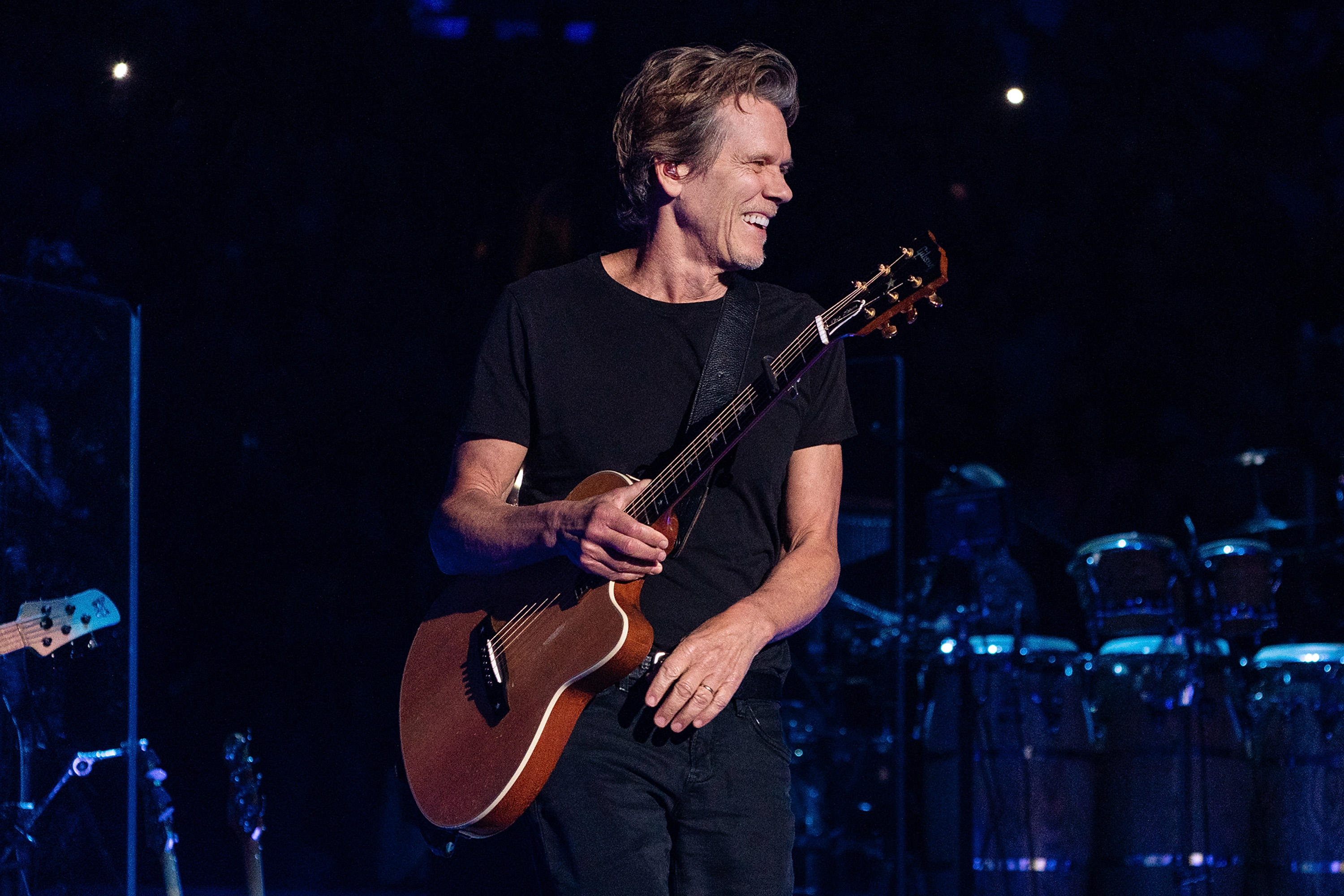 Kevin Bacon takes to the stage for a performance at Madison Square Garden in New York City on August 29, 2023 | Source: Getty Images