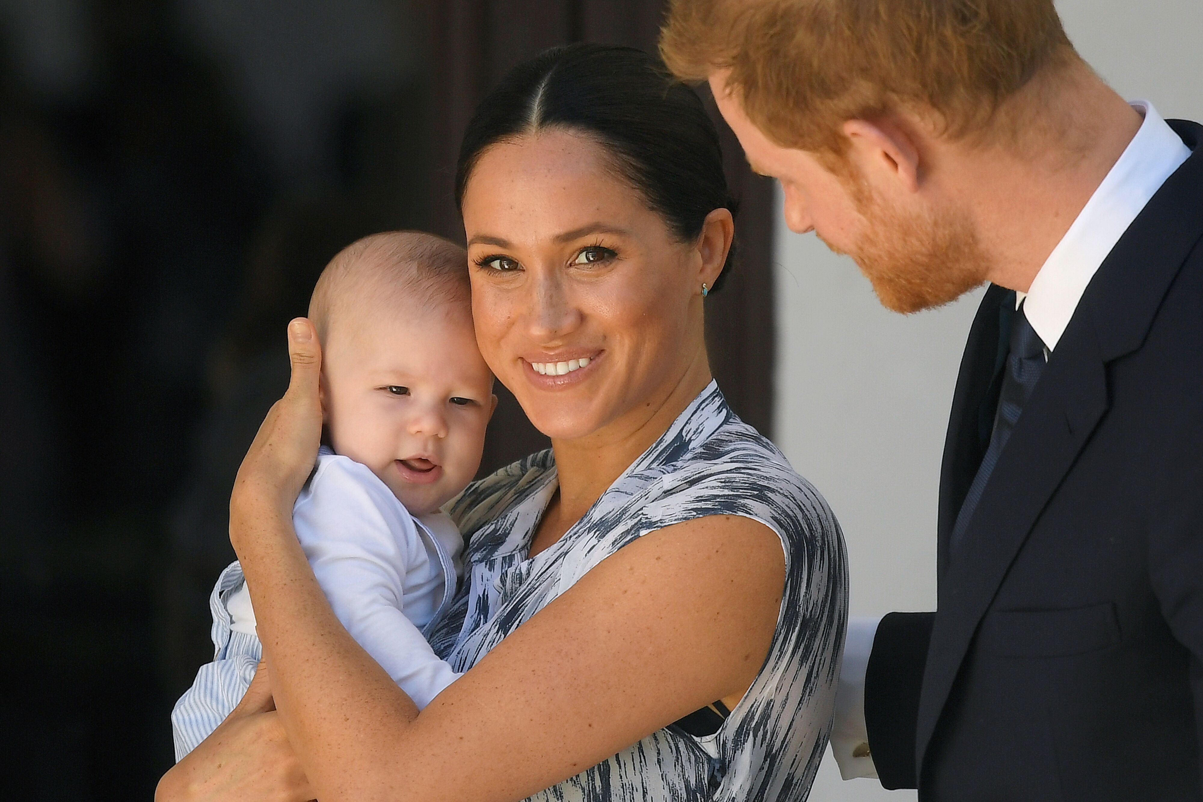 Prince Harry, Meghan Markle, and baby Archie at a meeting with Archbishop Desmond Tutu. | Source: Getty Images