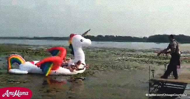 Women get stuck on a unicorn float and have to be rescued