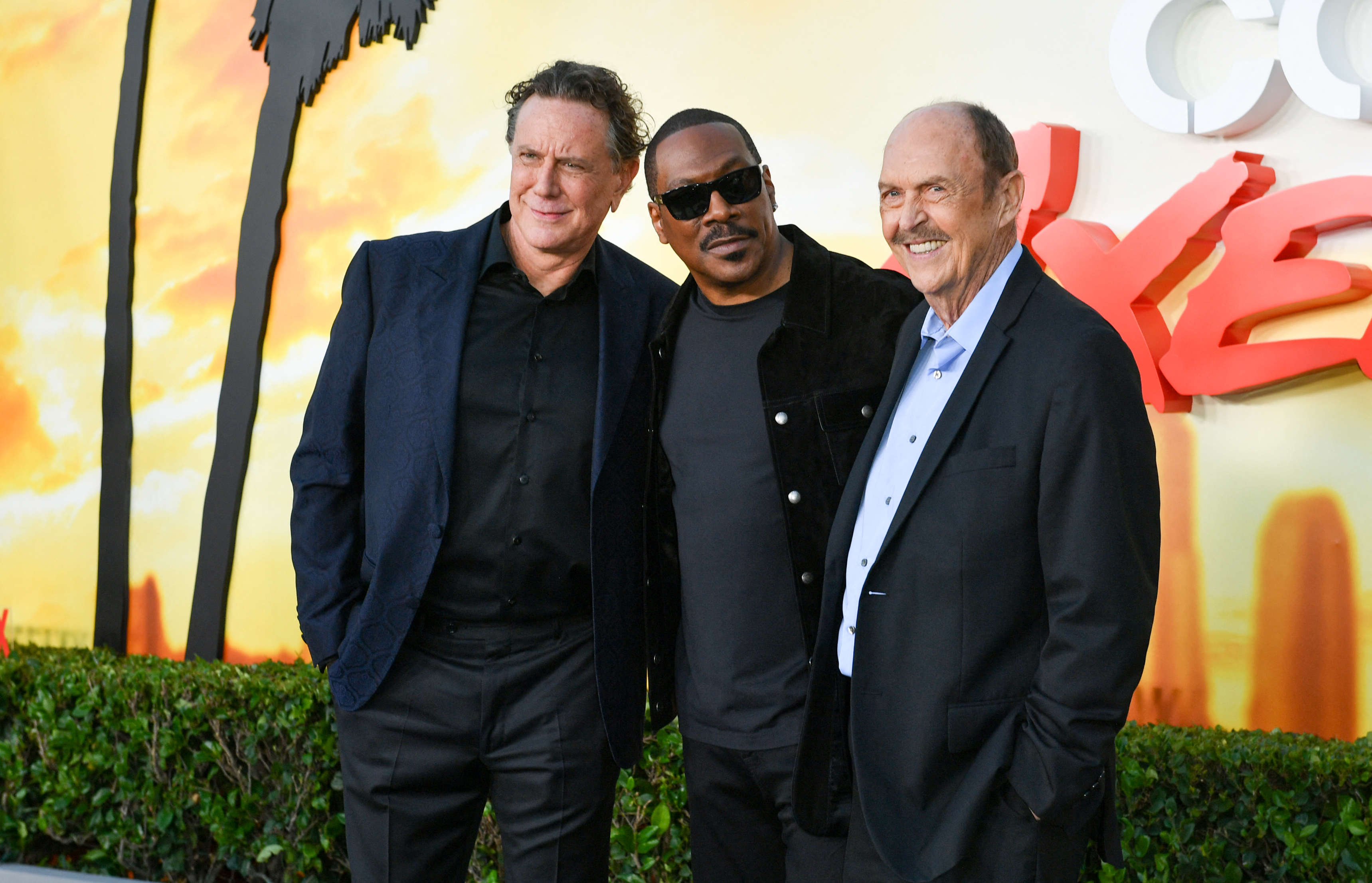 Judge Reinhold, Eddie Murphy, and John Ashton at Netflix's premiere of "Beverly Hills Cop: Axel F" at the Wallis Annenberg Center for the Performing Arts in Beverly Hills, California, on June 20, 2024 | Source: Getty Images