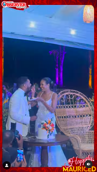 Stephanie Wash feeding some wedding cake to Etienne Maurice on their wedding day, posted on July 13, 2024 | Source: Instagram/jamaicaobserver