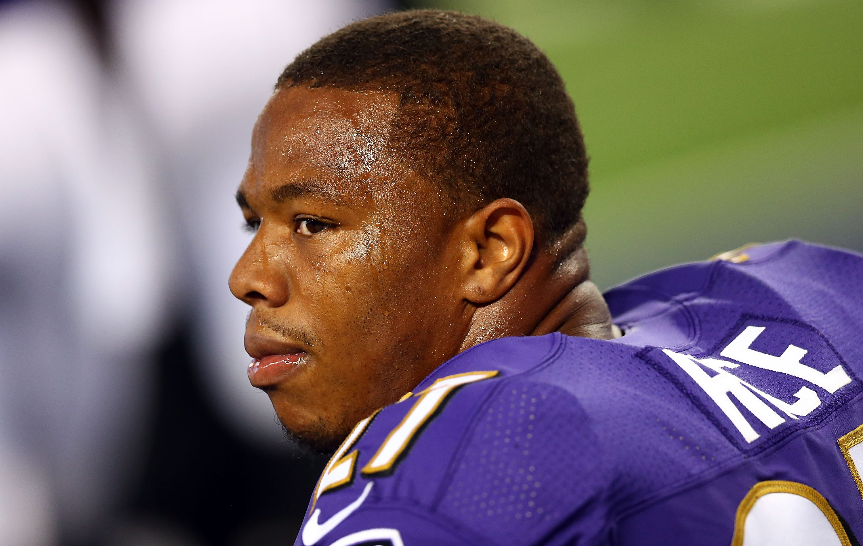 Ray Rice sits on the bench against the Dallas Cowboys in the first half of their preseason game at AT&T Stadium in Arlington, Texas on August 16, 2014. | Source: Getty Images