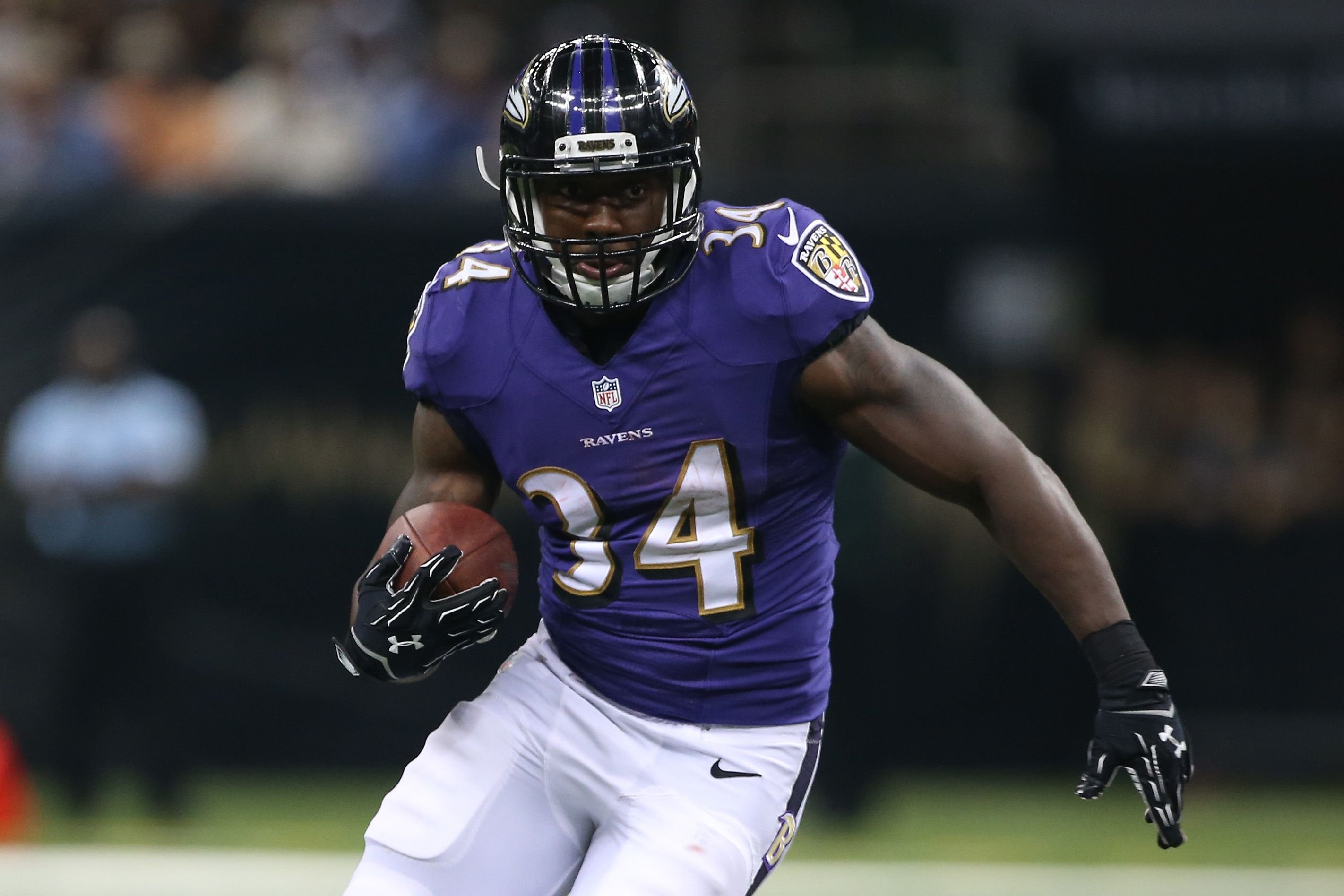 Lorenzo Taliaferro of the Baltimore Ravens playing against the New Orleans Saints on August 28, 2014, in New Orleans, Louisiana | Photo: Chris Graythen/Getty Images