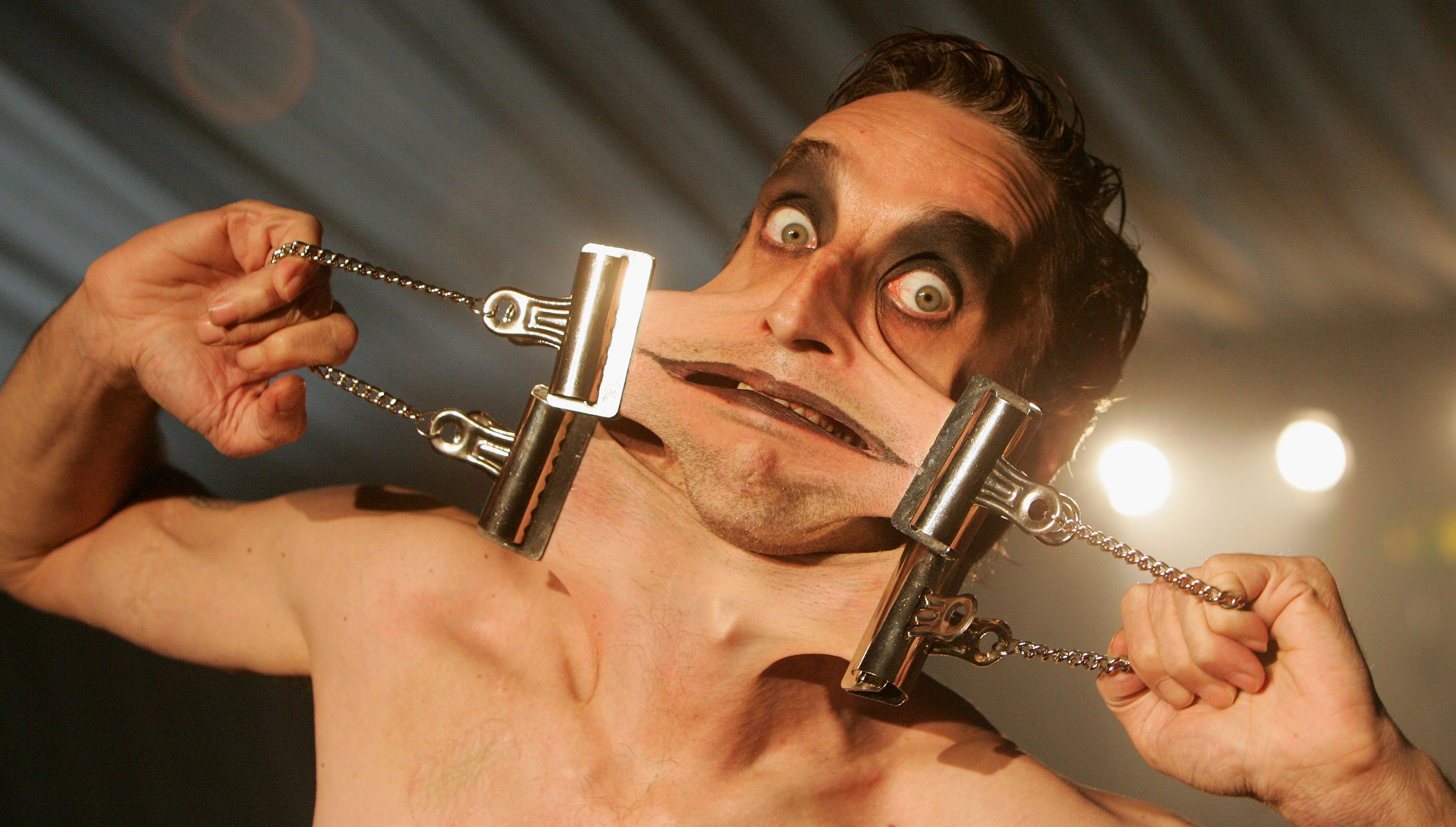 Garry Stretch, who holds the Guinness World Record for having the stretchiest skin, performs before the judges during the auditions for the Circus of Horrors at Fairfield Halls on October 7, 2005 in London, England. | Source: Getty Images 