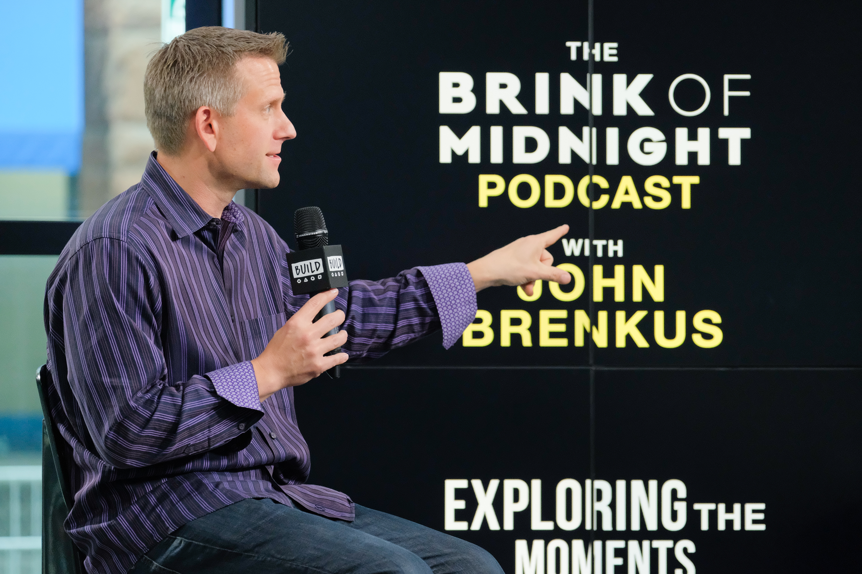 John Brenkus discusses his podcast "Brink Of Midnight" at Build Studio on June 5, 2017, in New York City | Source: Getty Images