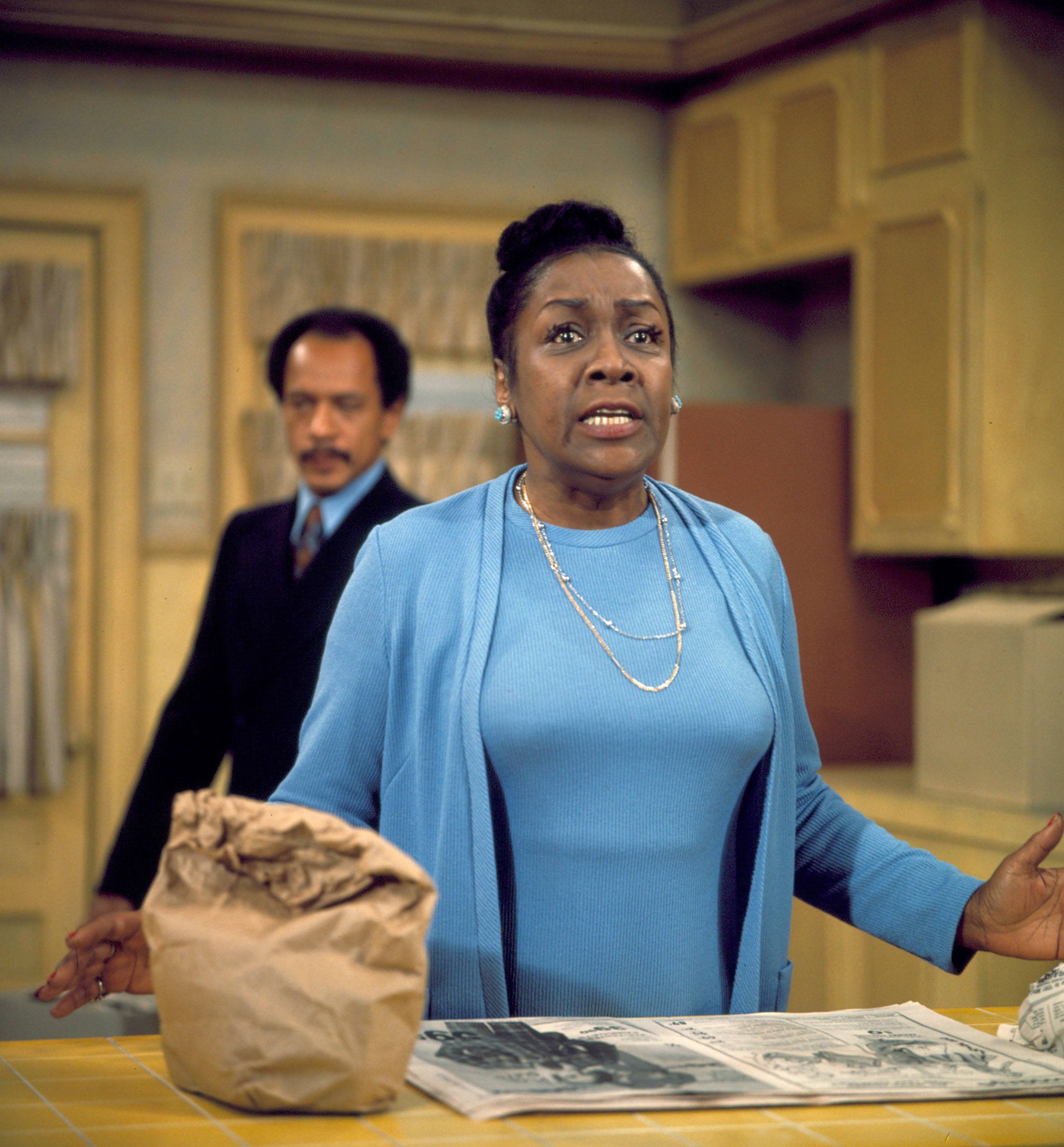 Sherman Hemsley (as George Jefferson) and Isabel Sanford (as Louise Jefferson) in a scene from "The Jeffersons" circa 1974 | Source: Getty Images