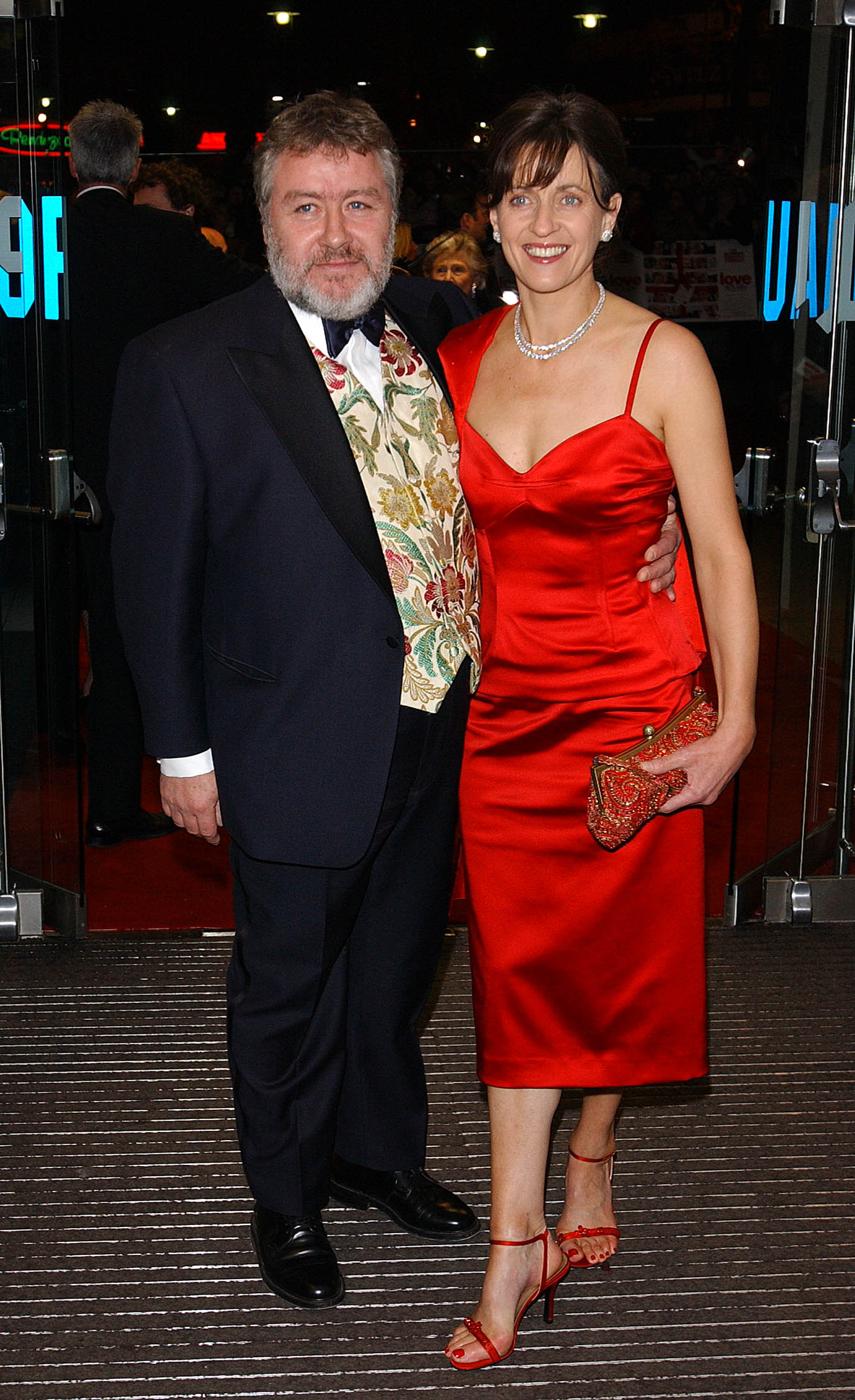 Gregor Fisher and his wife arrive for the UK charity premiere of Love Actually in aid of Comic Relief at the Odeon Leicester Square in central London, dressed for the red carpet.