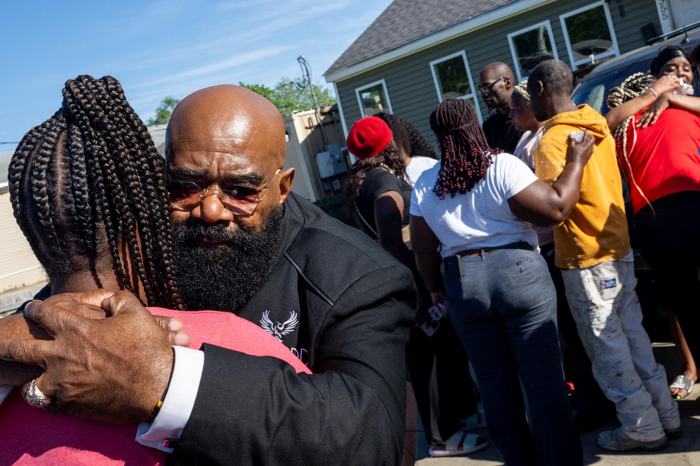 Community members embrace while mourning victims of a Shreveport shooting, April 19, 2026 | Source: Getty Images