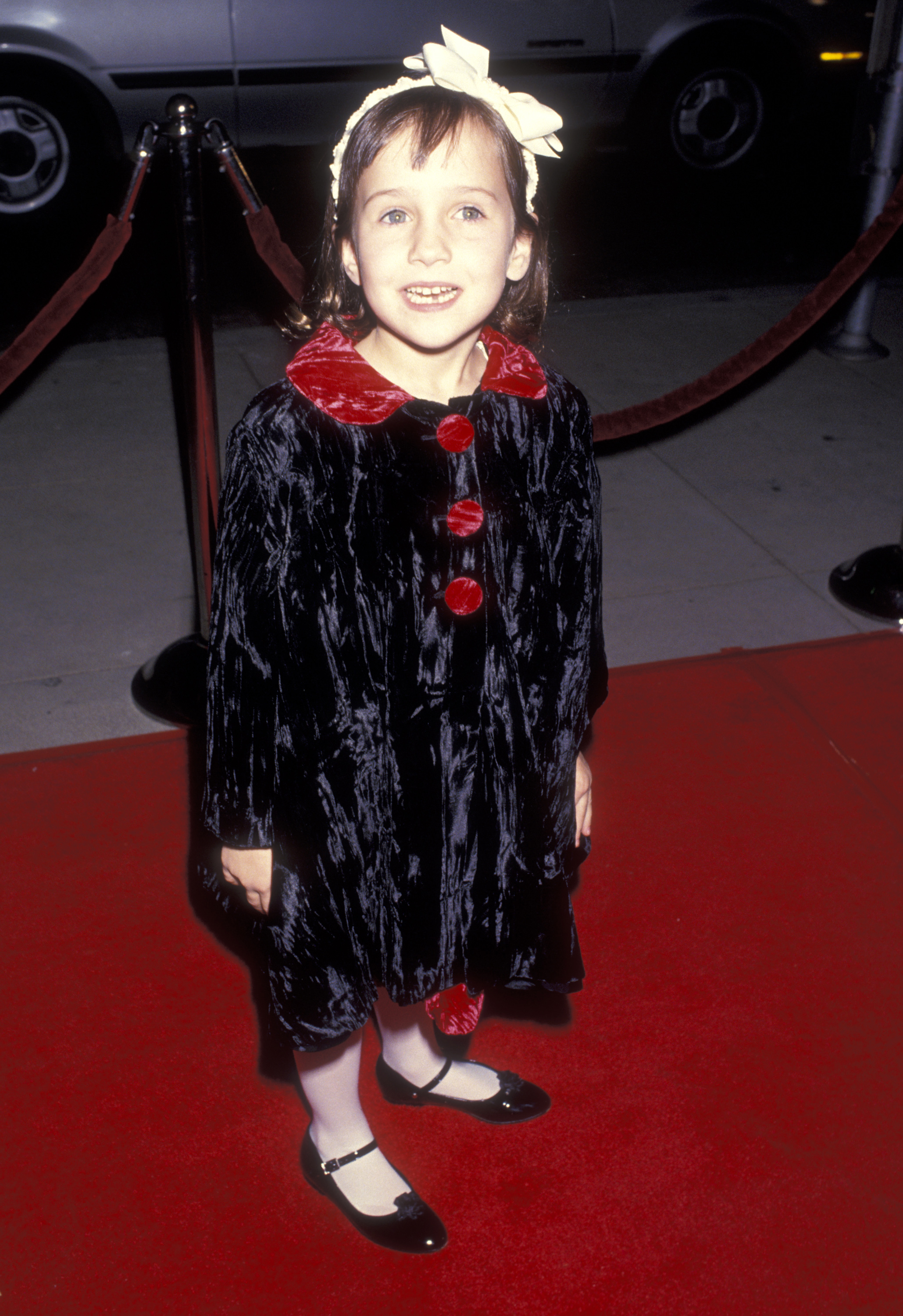 Mara Wilson attends the "Mrs. Doubtfire" premiere in Beverly Hills, California, on November 22, 1993 | Source: Getty Images