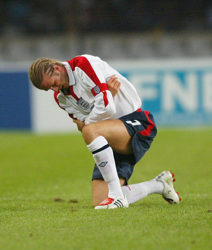 David Beckham in pain during a match between South Africa and England on May 22, 2003 in Durban, South Africa | Source: Getty Images