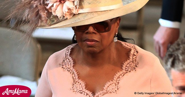 Oprah Winfrey arrives at Prince Harry & Meghan Markle's Royal wedding in a light pink dress