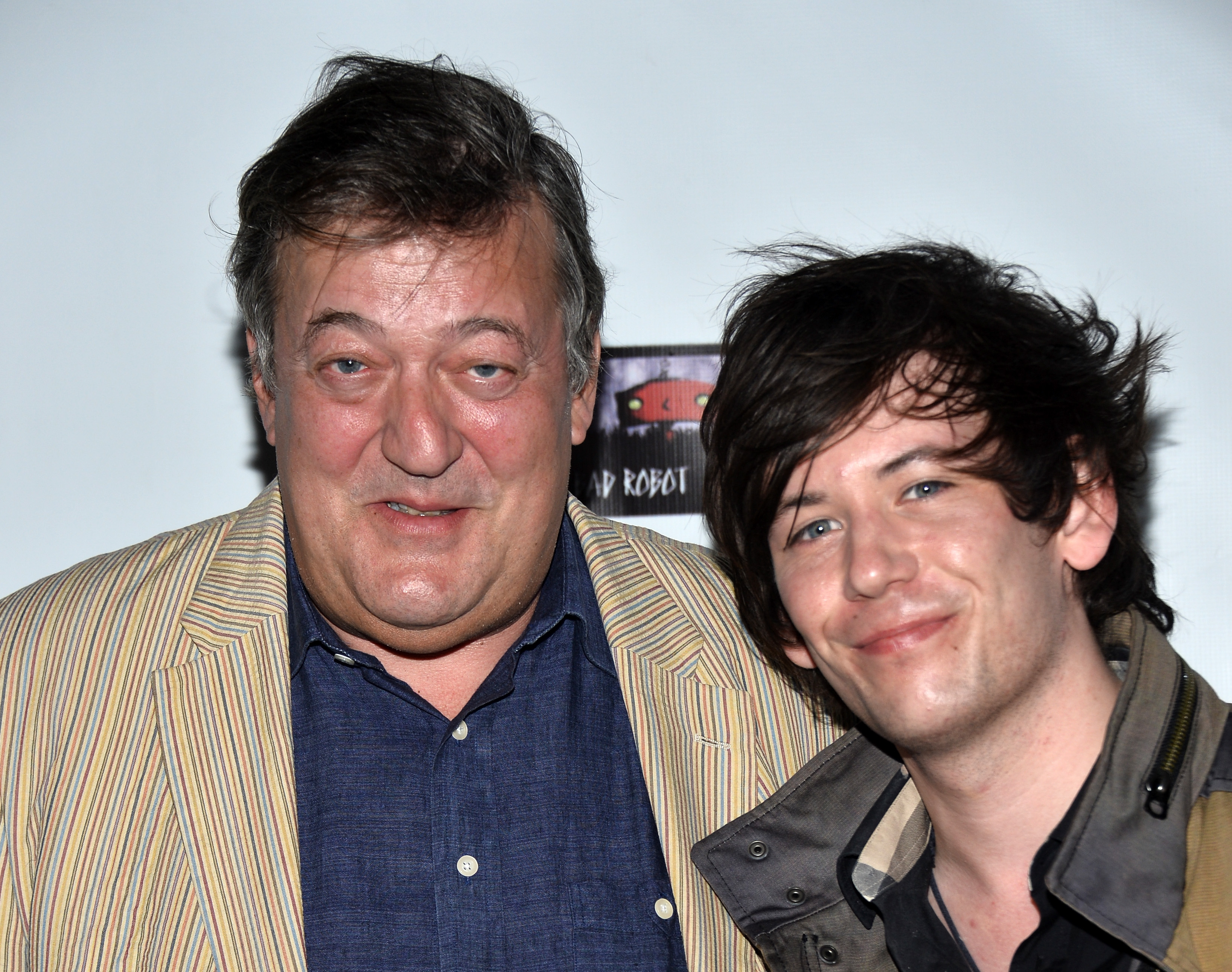Actor Stephen Fry and Elliott Spencer at the US-Ireland Alliance Pre-Academy Awards Honors event on February 19, 2015, in Santa Monica, California. | Source: Getty Images