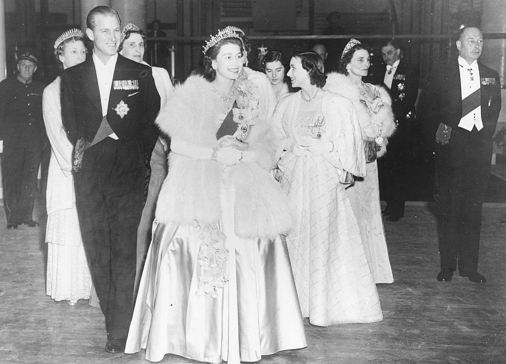 HM Queen Elizabeth II and Prince Philip, the Duke of Edinburgh, wearing formal dress as they attend a concert at Festival Hall. | Source: Getty Images