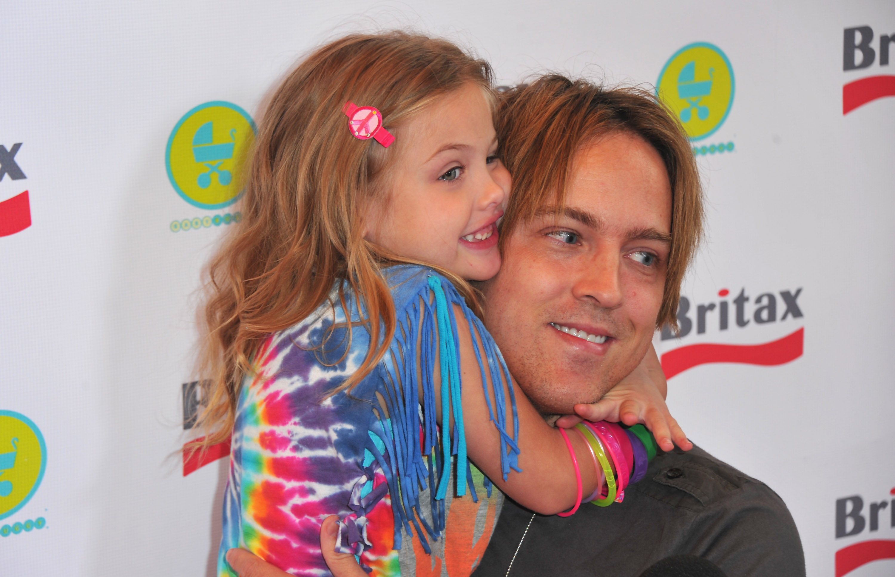 Dannielynn Birkhead and photographer Larry Birkhead attend a pre-Father's Day Mini Golf Open hosted by Britax and Baby Buggy at Castle Park, on June 11, 2011, in Sherman Oaks, California. | Source: Getty Images