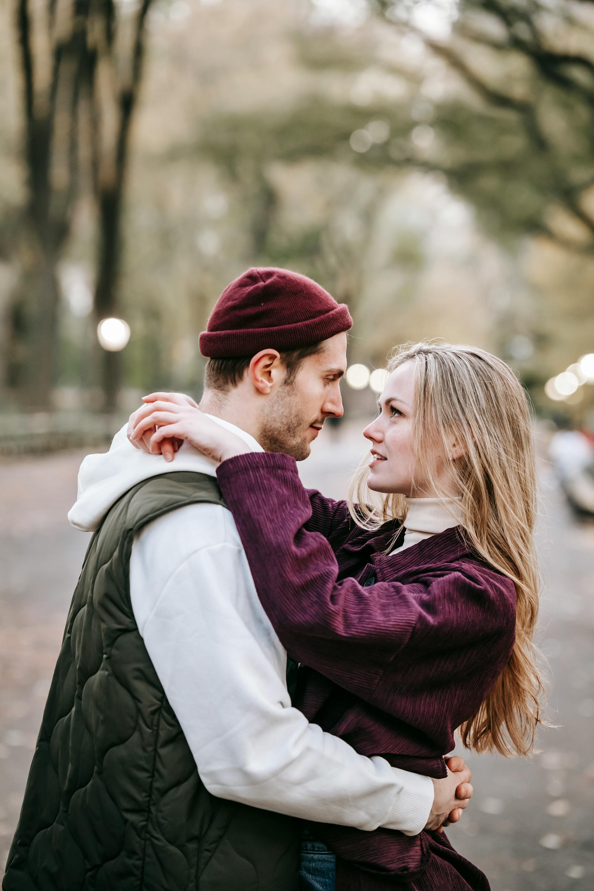 A couple looking into each other's eyes while hugging | Source: Pexels