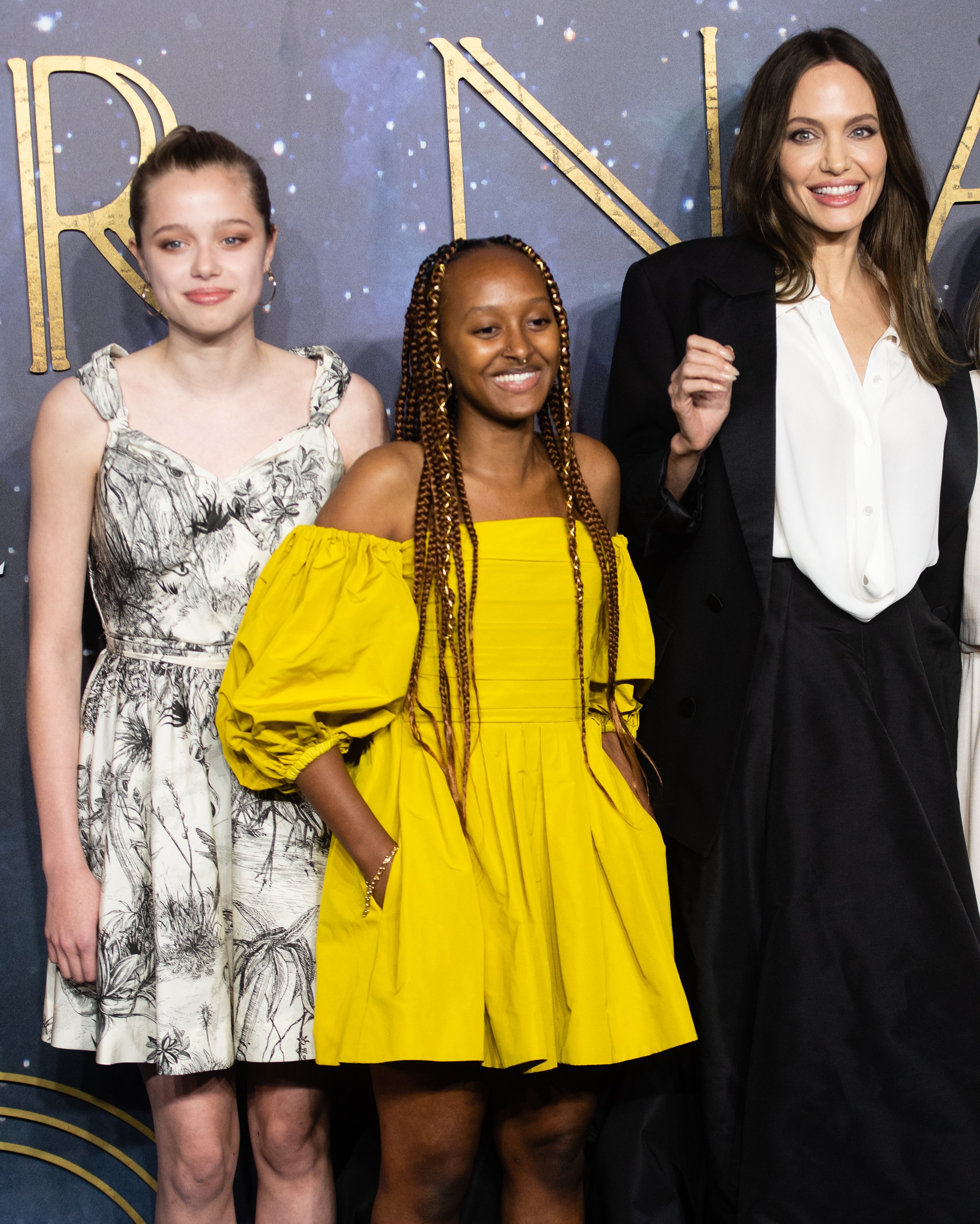 Shiloh Jolie-Pitt, Zahara Jolie-Pitt, and Angelina Jolie at\\u00a0the "Eternals" UK premiere on October 27, 2021, in London, England | Source: Getty Images