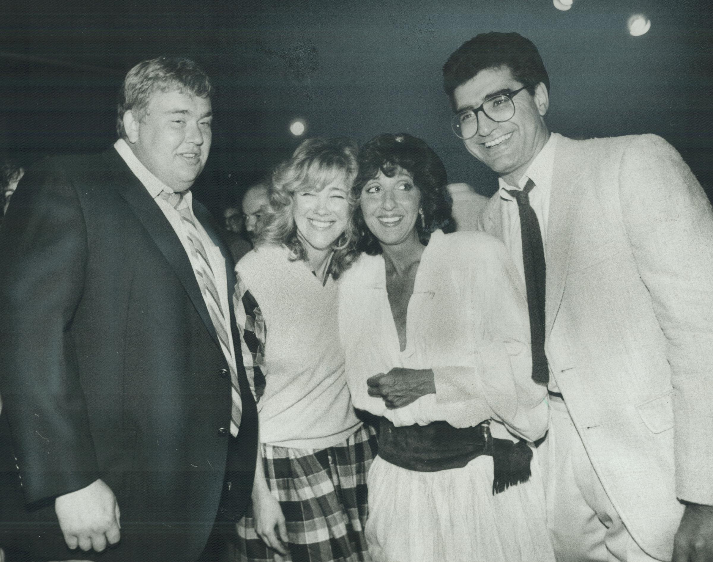 John Candy, Catherine O'Hara, Andrea Martin and Eugene Levy during the Second City reunion party on Lombard St. on July 24, 1983, in Toronto, Canada | Source: Getty Images