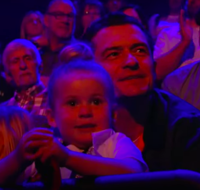 Daisy Dove Bloom and Orlando Bloom watching Katy Perry in the "American Idol" crowd, posted on May 14, 2024 | Source: YouTube/Entertainment Tonight