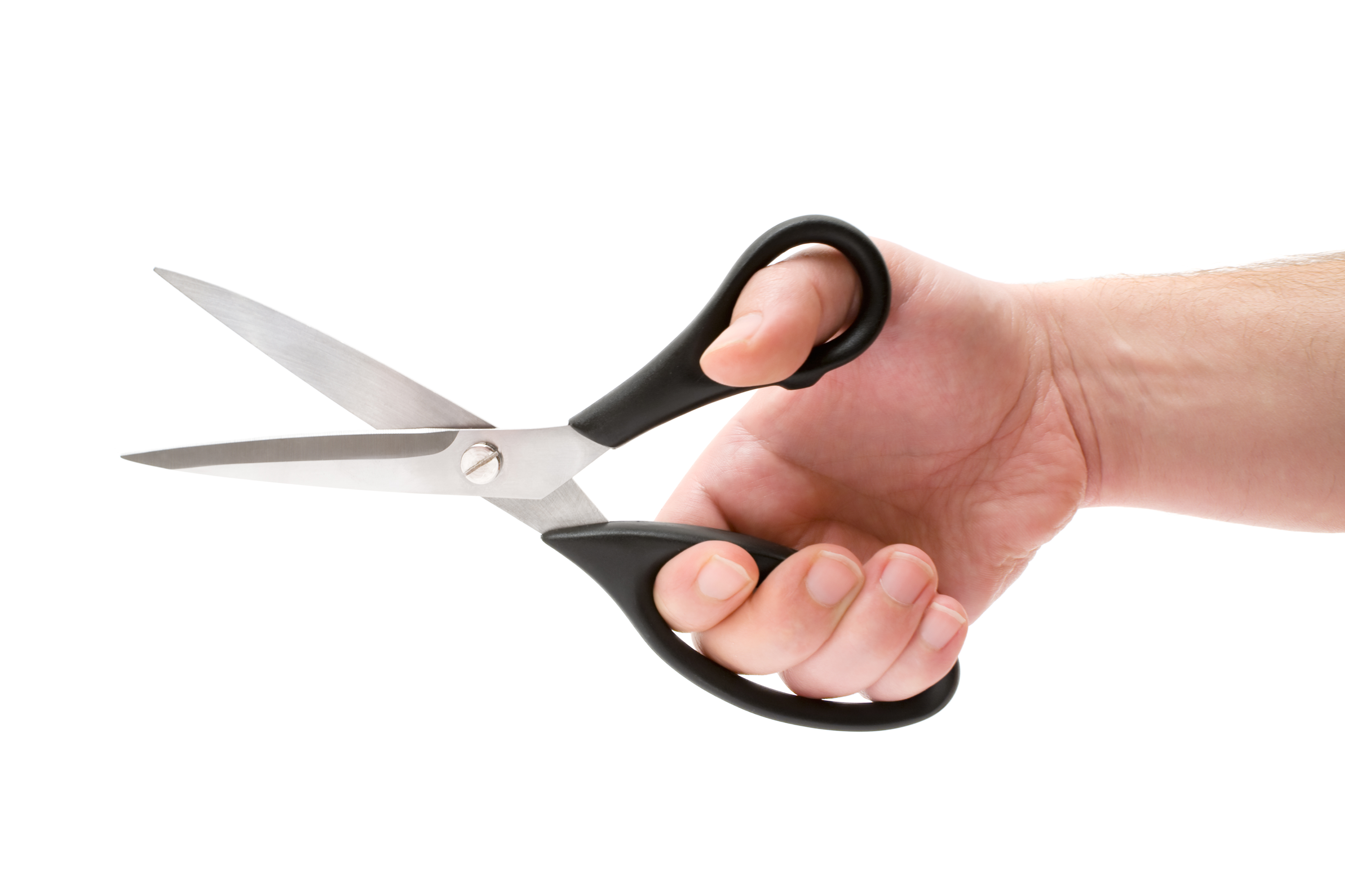 Someone holding a pair of scissors | Source: Getty Images