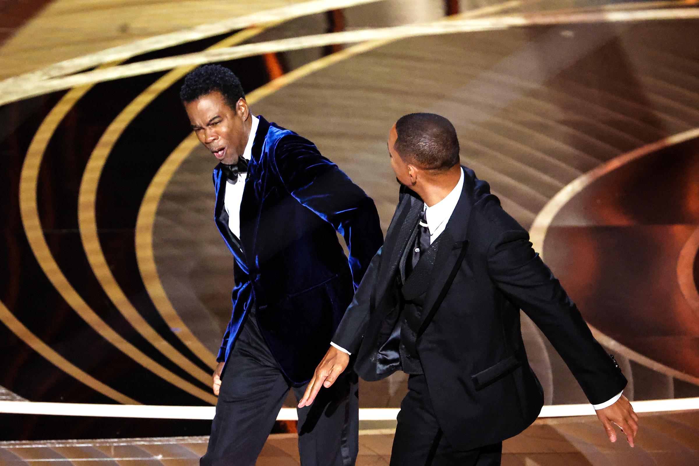 Will Smith slaps Chris Rock onstage at the 94th Academy Awards held at Dolby Theatre on March 27, 2022 | Source: Getty Images