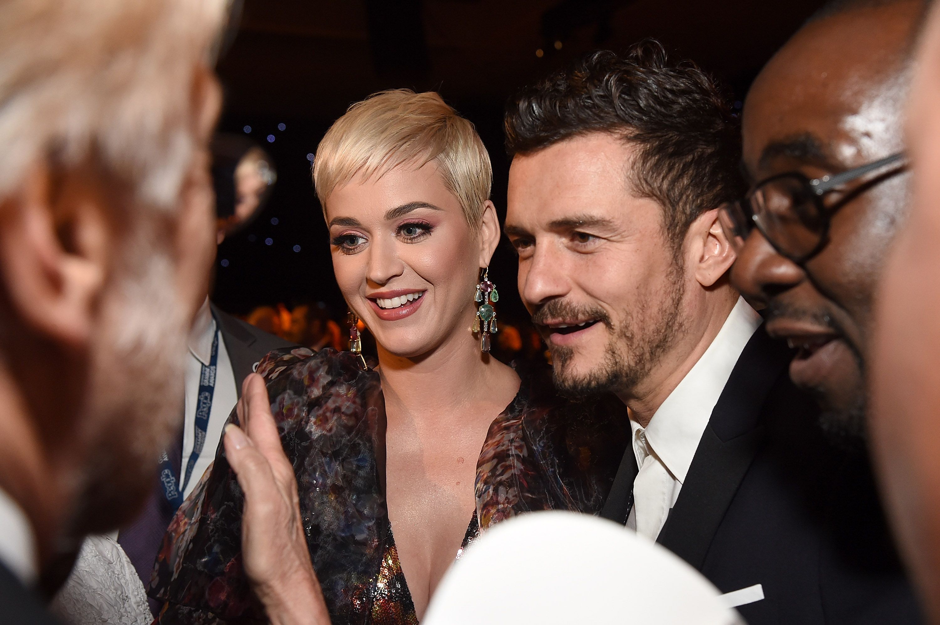 Katy Perry (L) and Orlando Bloom attend MusiCares Person of the Year honoring Dolly Parton at Los Angeles Convention Center on February 8, 2019 in Los Angeles, California. | Source: Getty Images