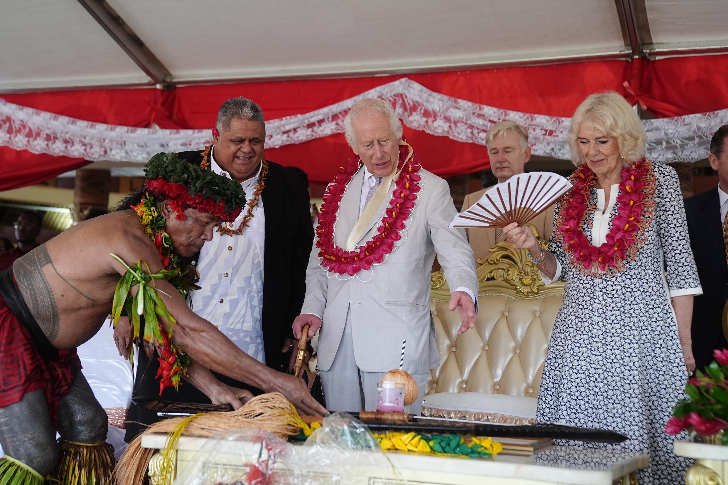 King Charles III and Queen Camilla with Samoan locals and officials. | Source: Getty Images