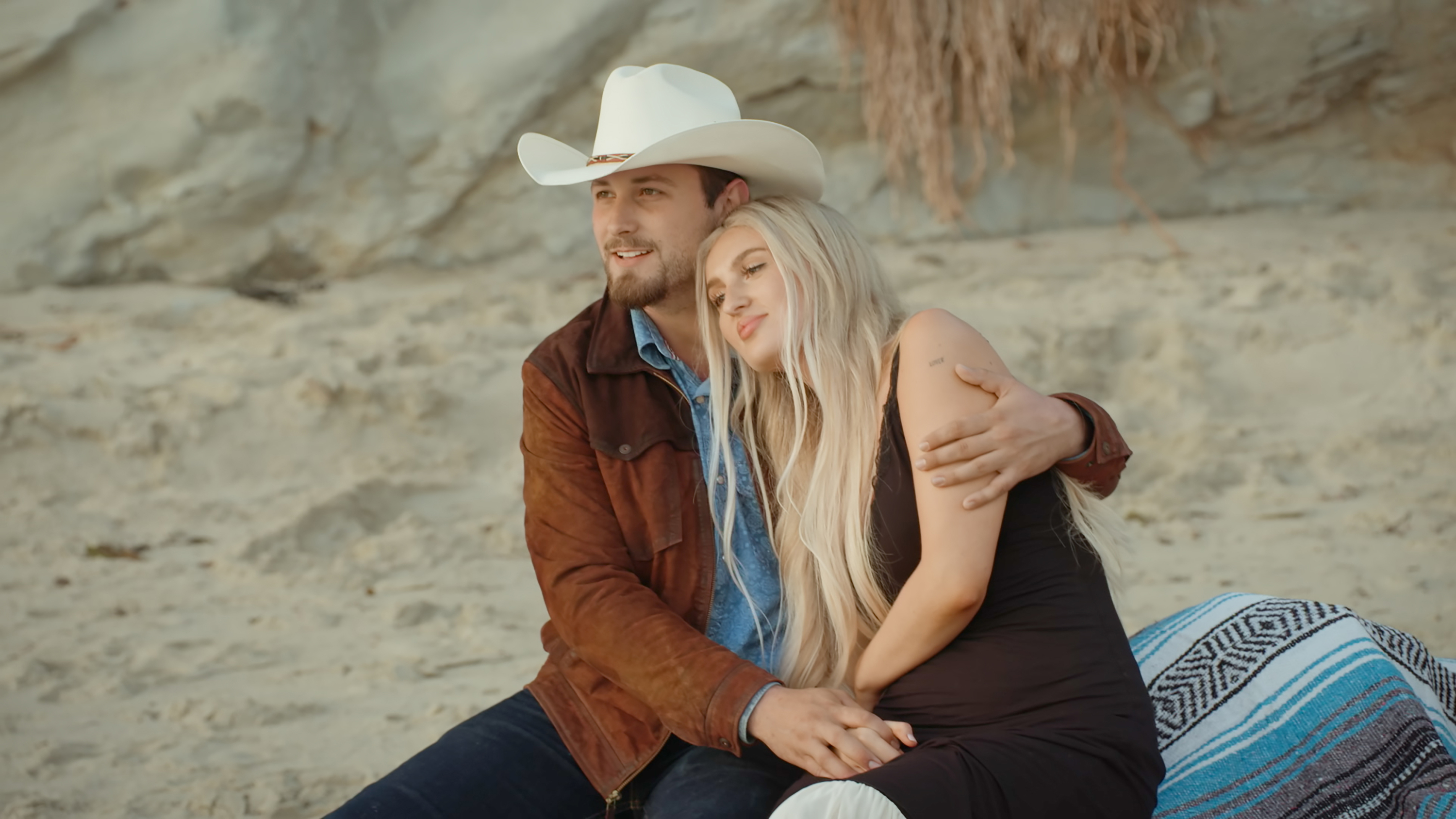 Farmer Mitchell and Dater Kait in the "Family City Visits Part 2" episode of "Farmer Wants a Wife" | Source: Getty Images