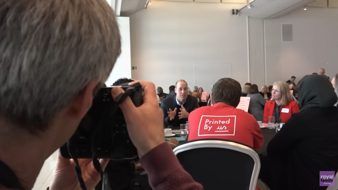Prince William engages in a lively discussion at a table with the residents in Sheffield in March 2024. | Source: YouTube.com/royalchannel
