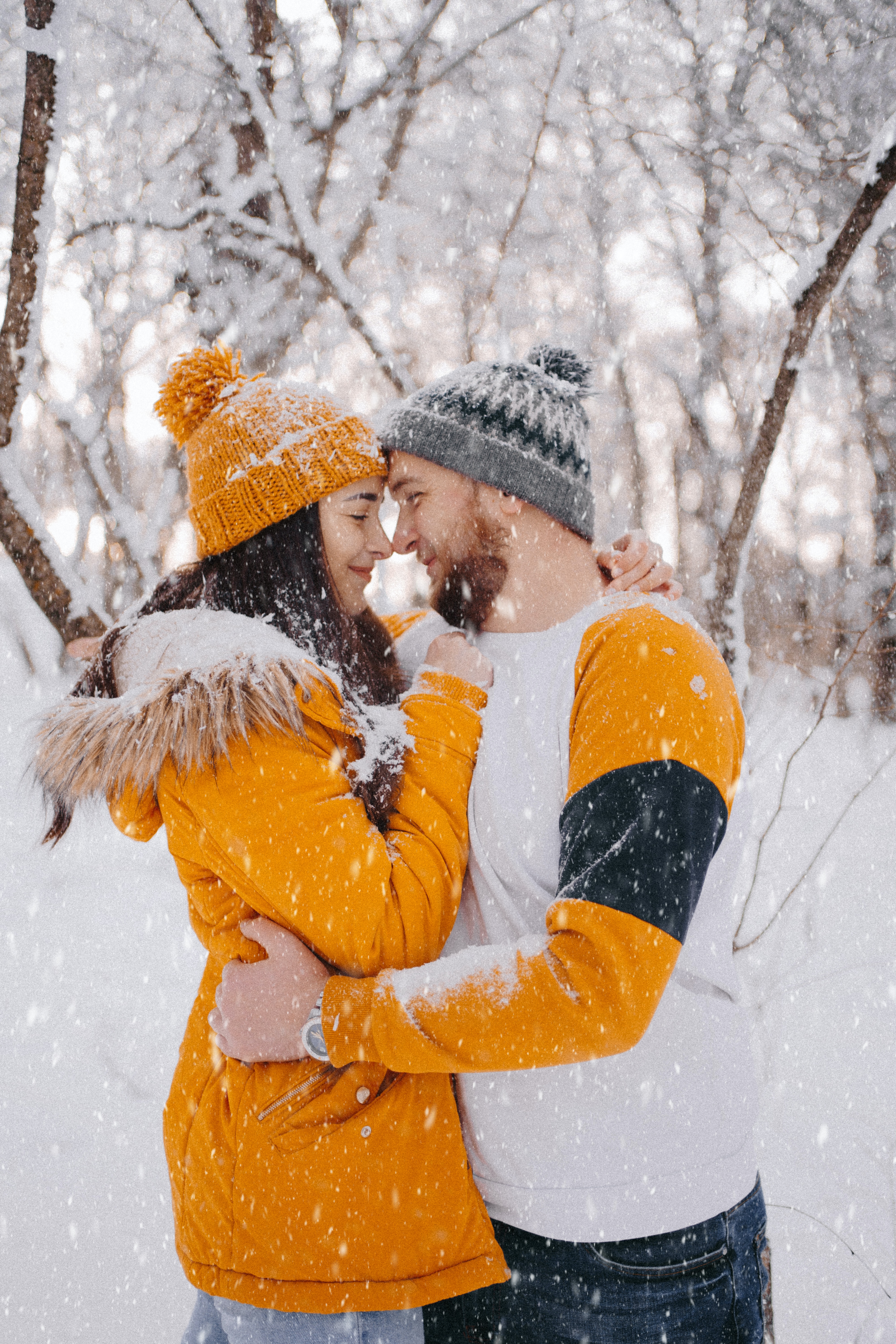Romantic couple on a snowy day | Source: Unsplash