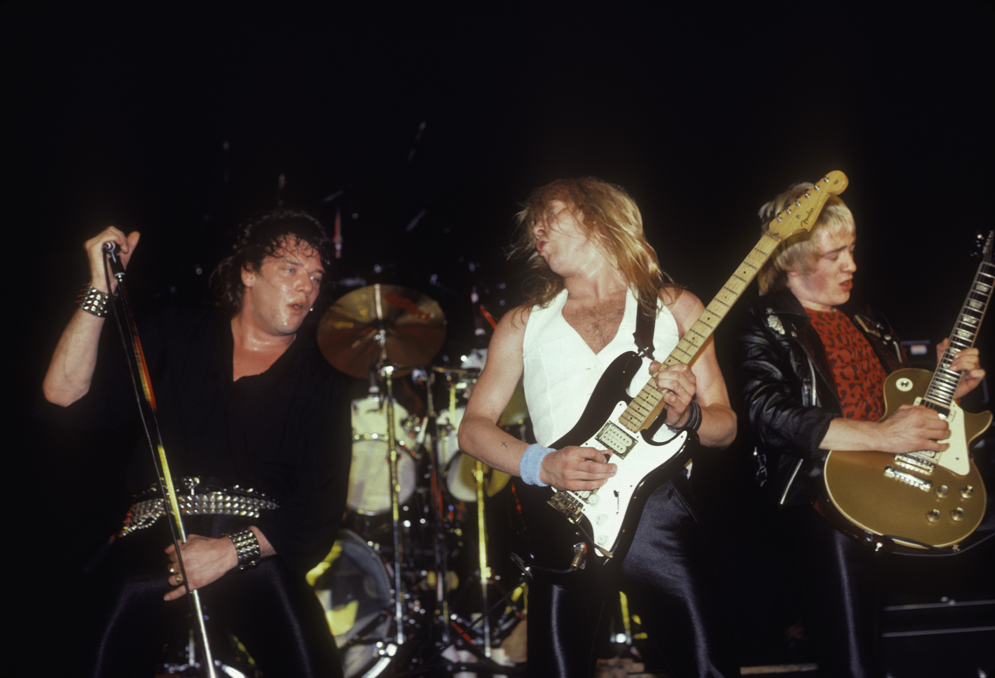 Paul Di'Anno, Dave Murray and Adrian Smith performing live onstage on Iron Maiden's Killer World Tour in 1981 | Source: Getty Images