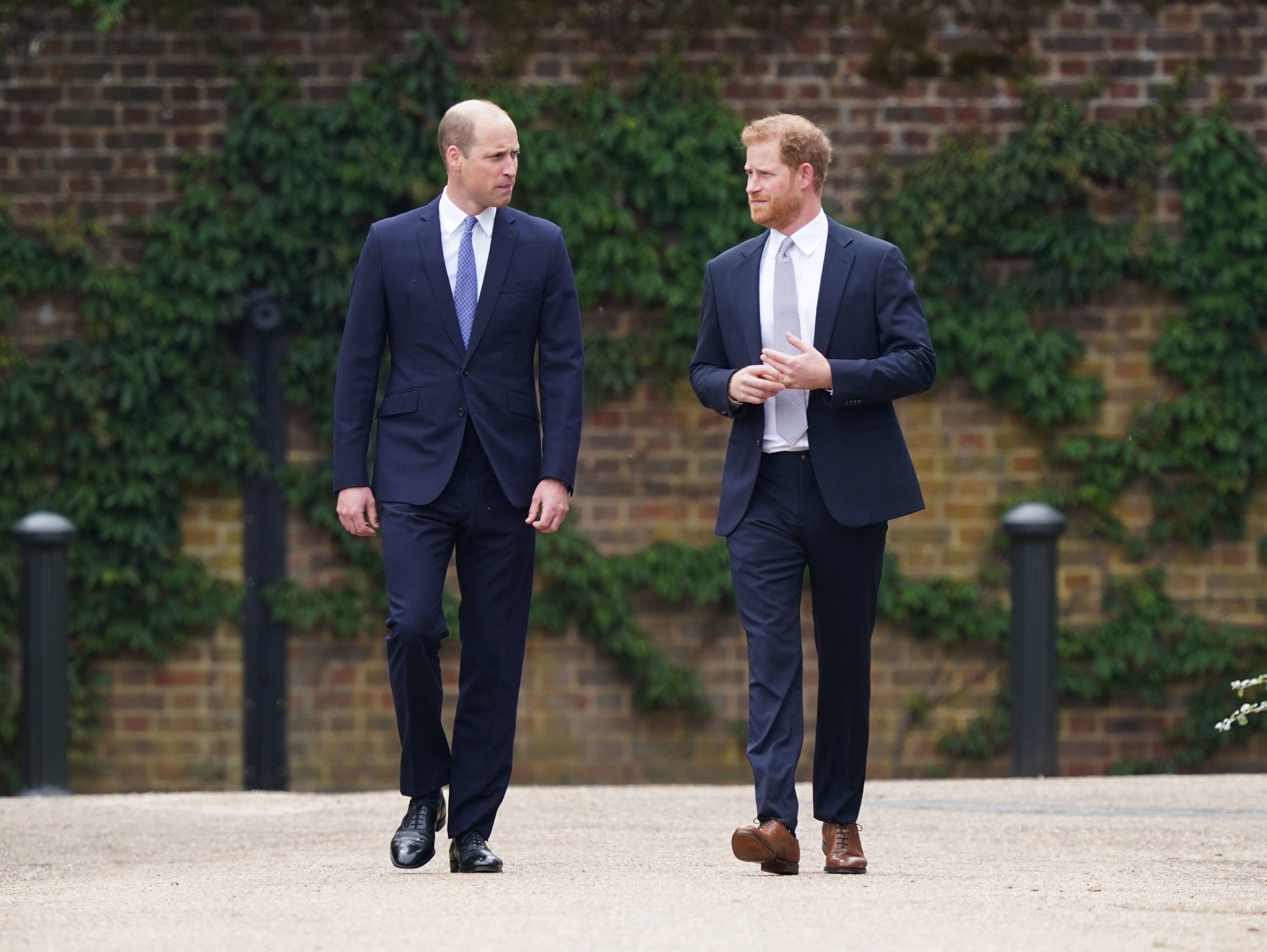 Prince William and Prince Harry at the unveiling of a statue of their mother Princess Diana at Kensington Palace on July 1, 2021, in London, England. | Source: Getty Images