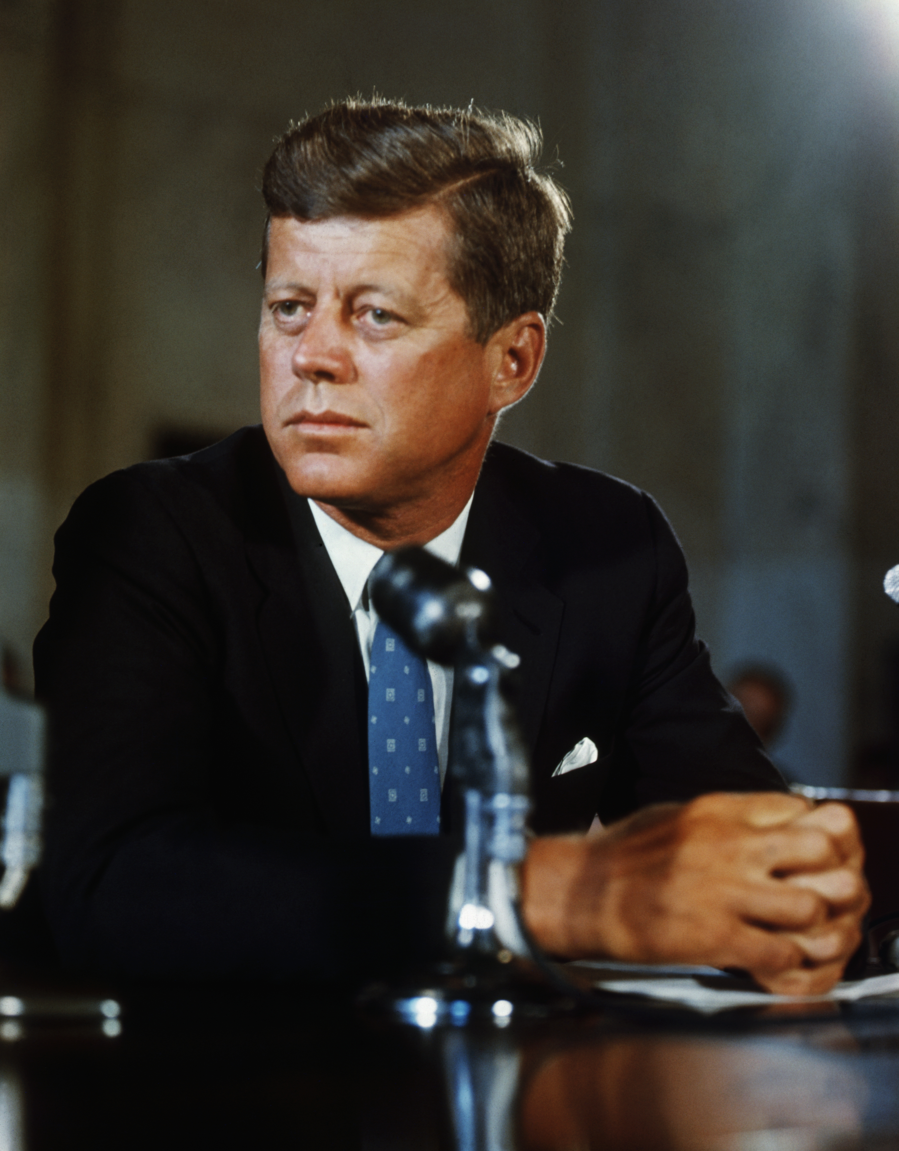 US President John F. Kennedy sits at his desk in the White House on his first day in office in 1961 | Source: Getty Images