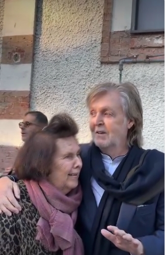 A closer view revealed the finer details of Paul McCartney's evolving look, with his greying hair falling naturally and a more noticeable stubble softening his features. His thoughtful expression and subtle gestures suggested he was deep in conversation, offering a glimpse of a more intimate, unguarded side of the music legend during the Paris outing. | Source: Instagram/suzymenkes