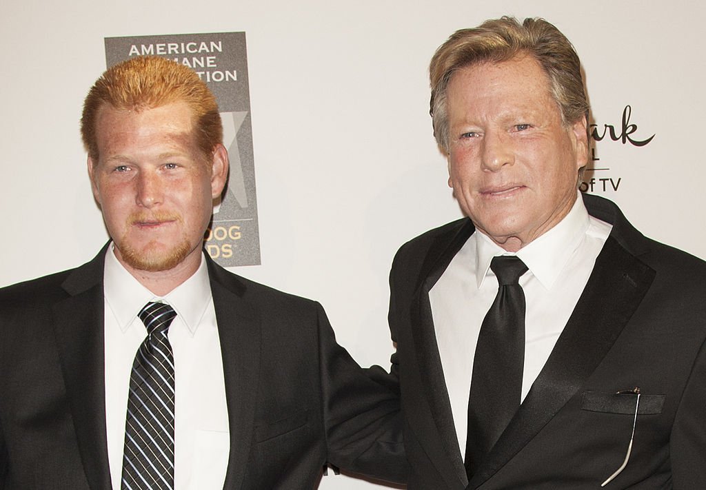 Redmond O'Neal and dad, Ryan O'Neal, arrive at the 3rd Annual American Humane Association Hero Dog Awards at The Beverly Hilton Hotel on October 5, 2013.  | Photo: Getty Images