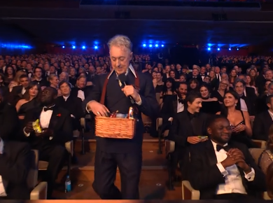 Alan Cumming walking away from Timothée Chalamet and Kylie Jenner after giving them snacks at the 79th BAFTA Film Awards dated February 22, 2026 | Source: TikTok/bbc