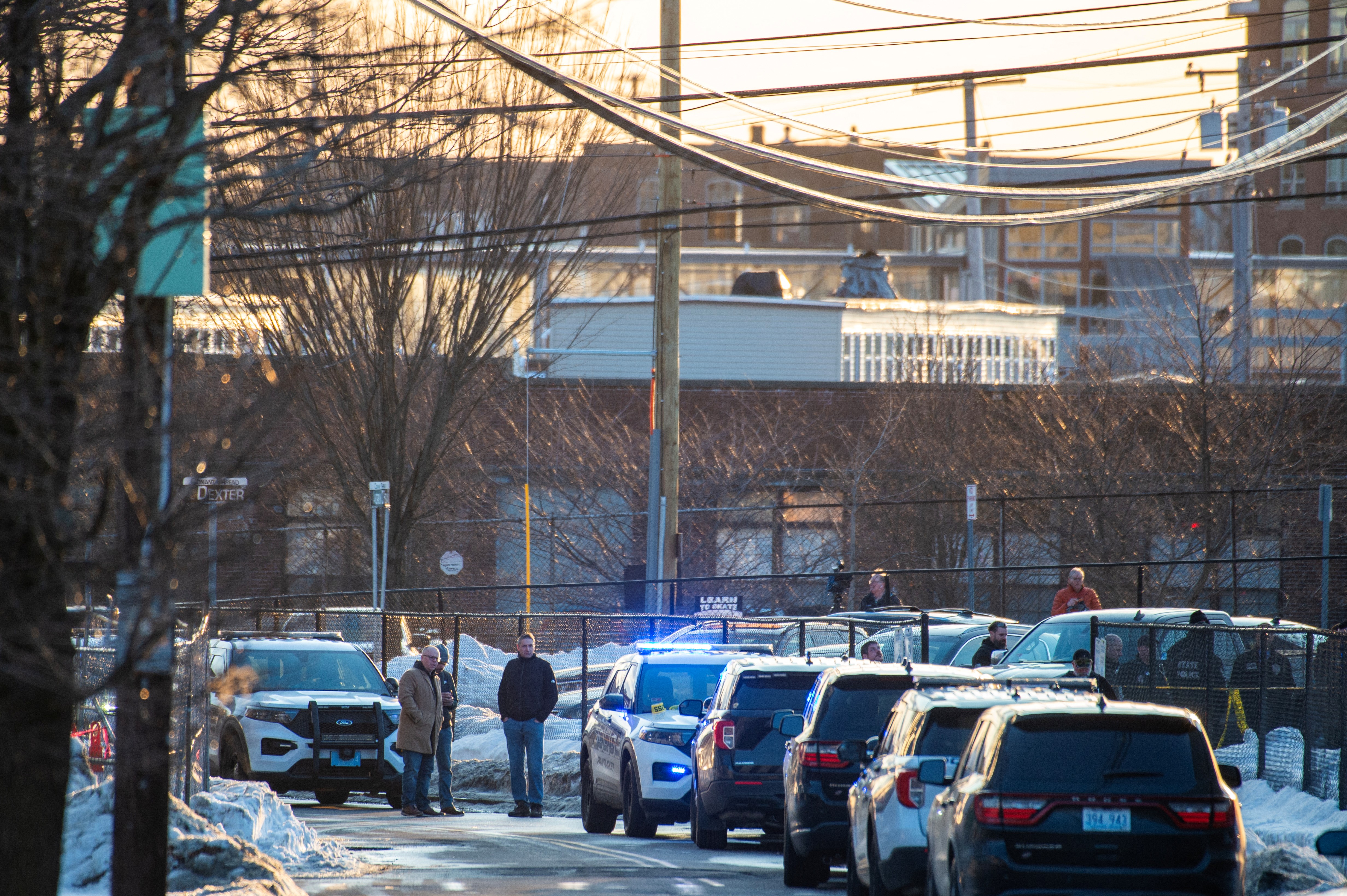 Police vehicles line a street outside Dennis M. Lynch Arena in Pawtucket, Rhode Island | Source: Getty Images