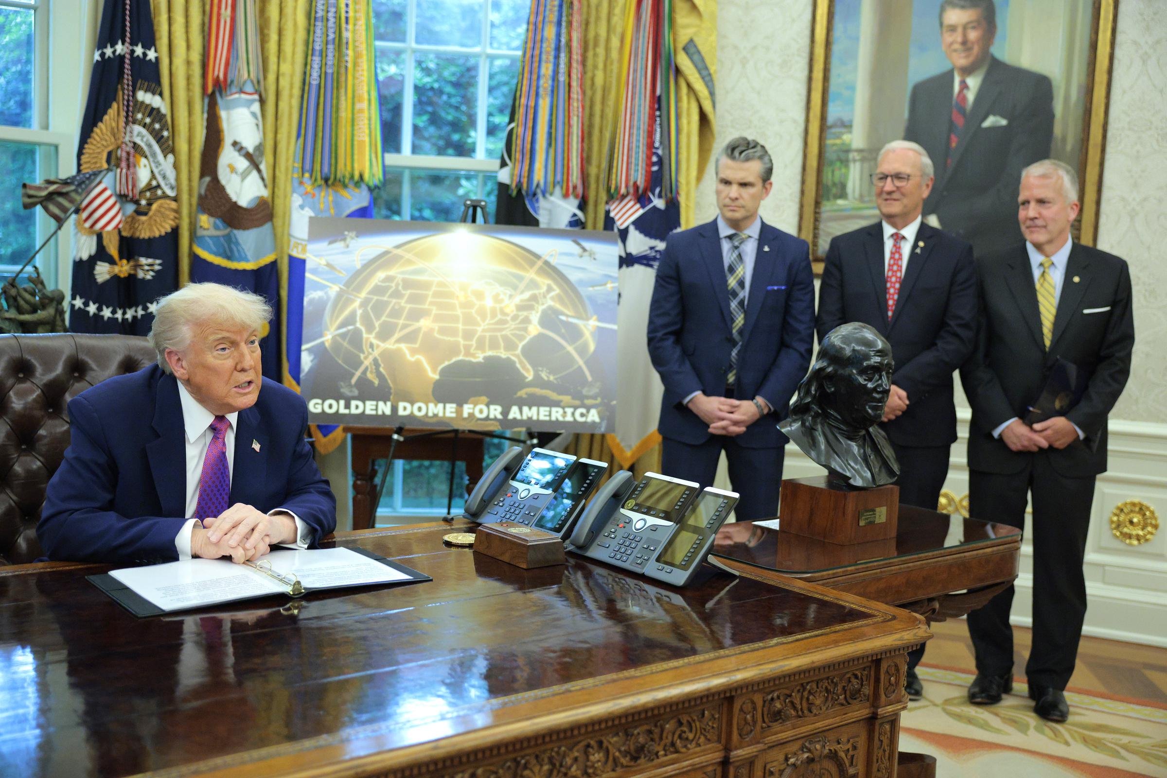 President Donald Trump speaks alongside Secretary of Defense Pete Hegseth, Sen. Kevin Cramer (R-ND) and Sen. Dan Sullivan (R-AK) in the Oval Office at the White House on May 20, 2025 | Source: Getty Images