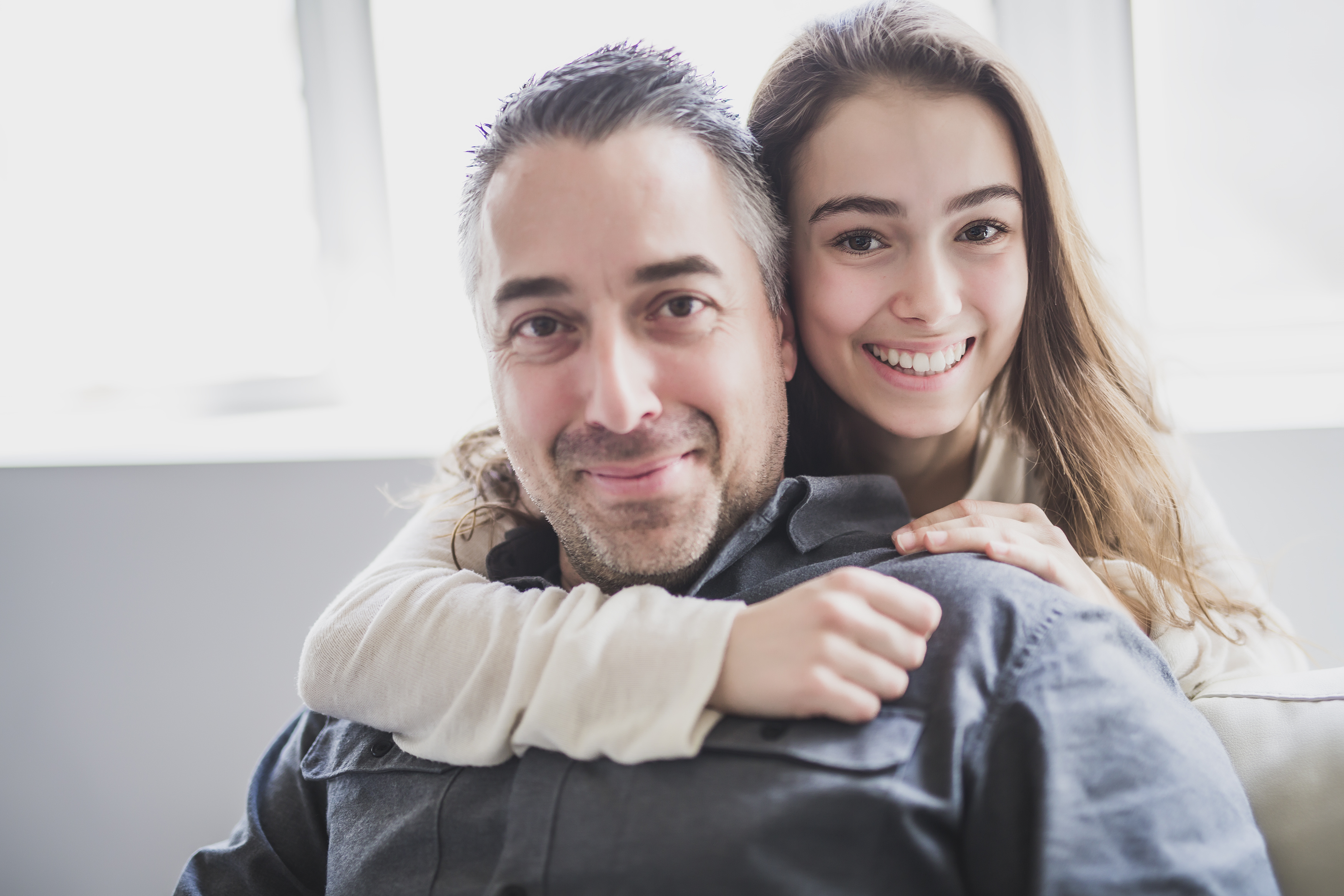 A young girl with an older man | Source: Shutterstock