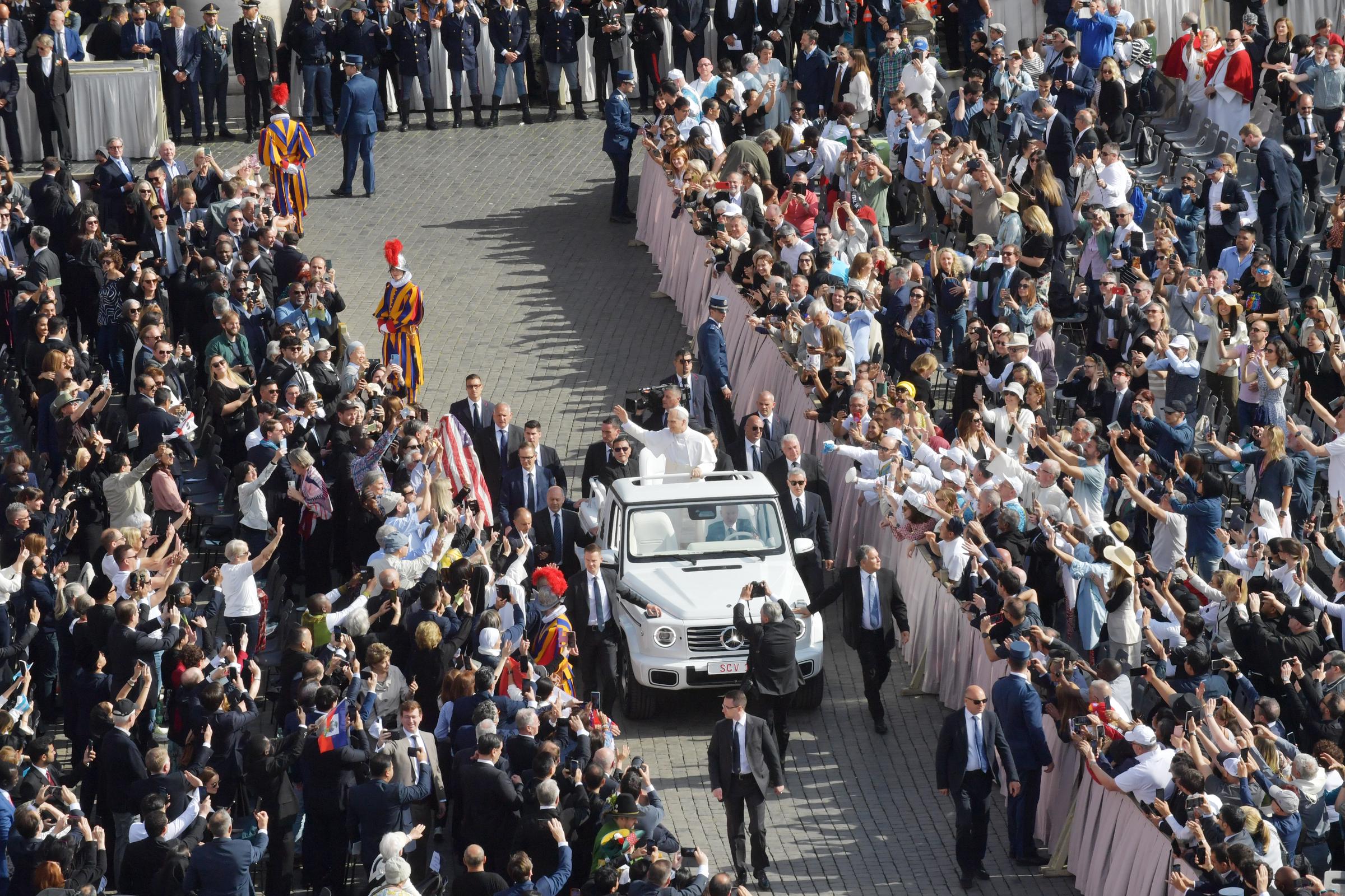 Pope Leo XIV greets the crowd from the Popemobile as he arrives for his Inauguration Mass in St. Peter's Square on May 18, 2025, in Vatican City. | Source: Getty Images